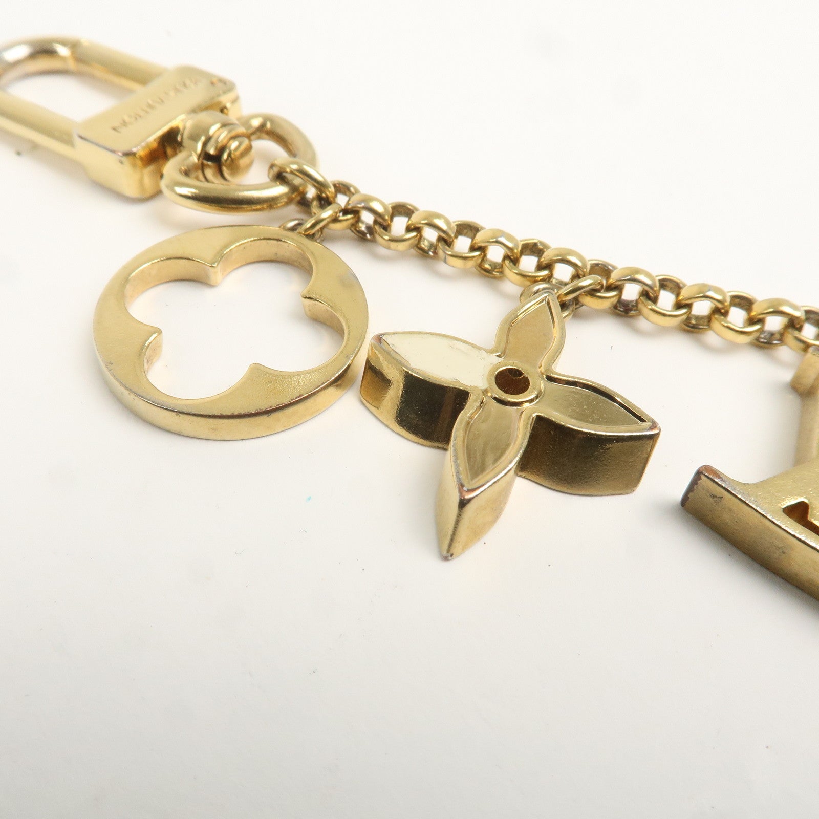 Louis Vuitton Fleur de Monogram LV Logo Bag Charm M65111