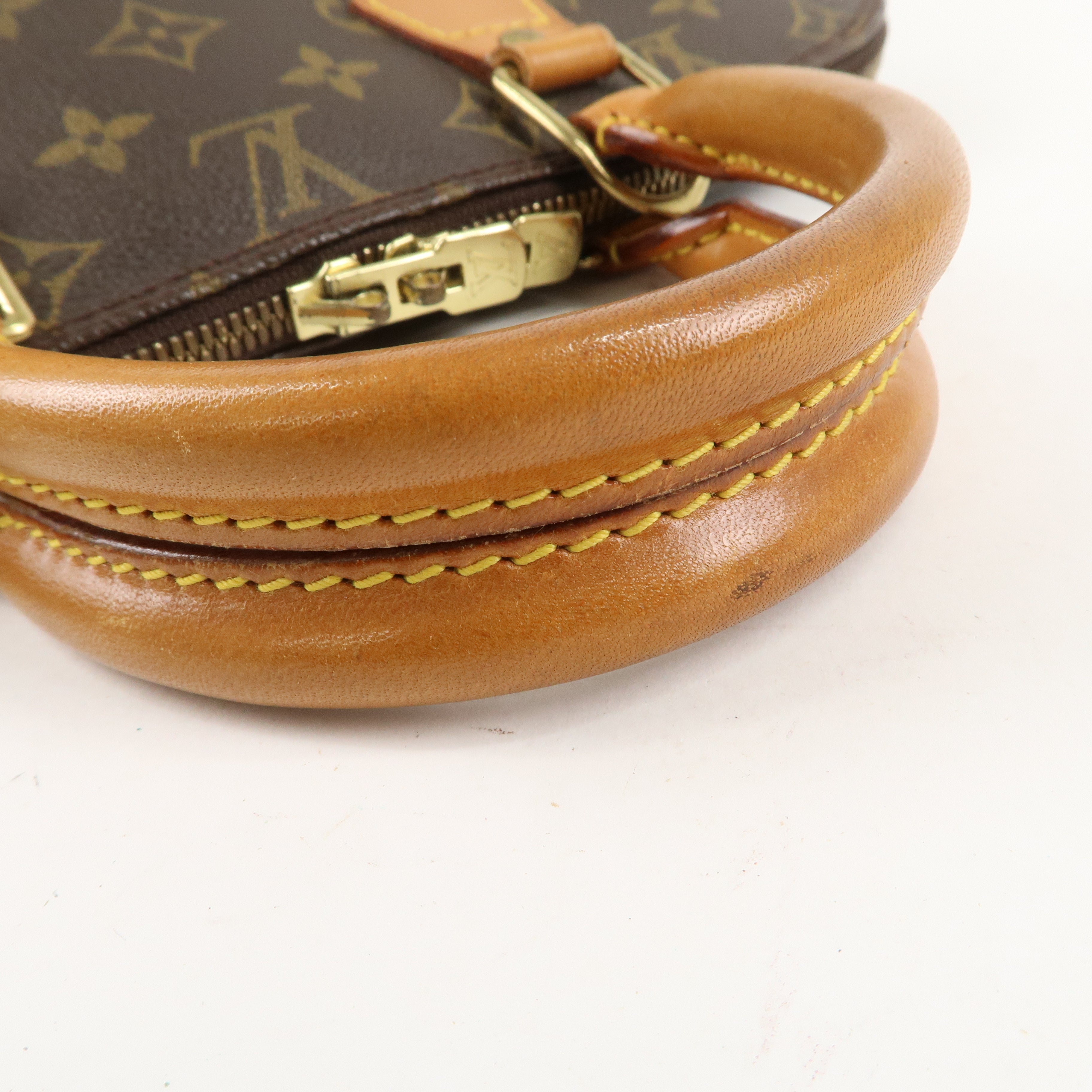 Louis Vuitton Monogram Alma Hand Bag Brown M51130