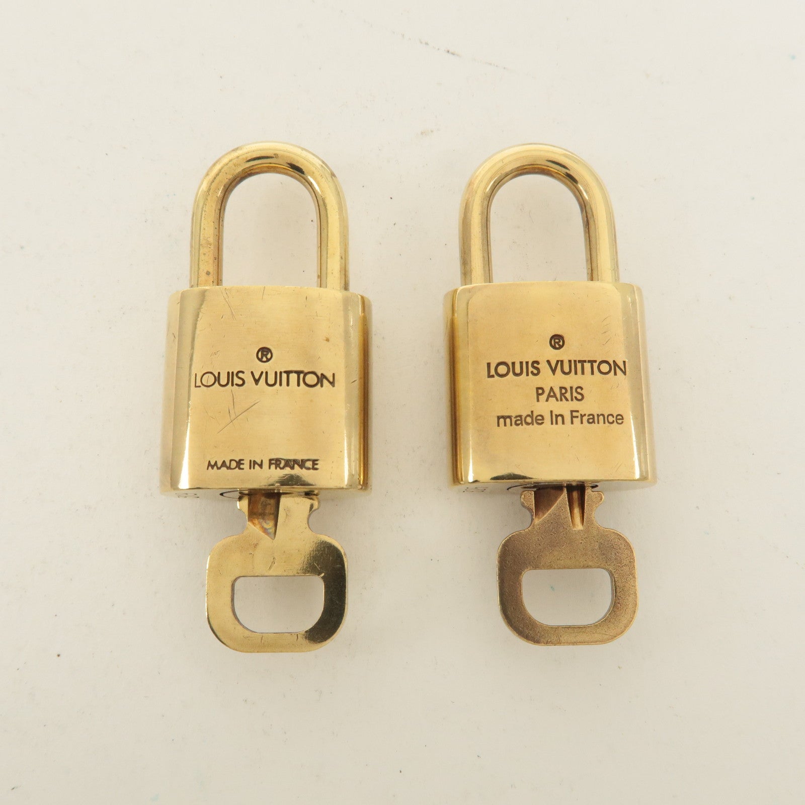 Louis Vuitton Set of 10 Lock 
Key Cadena Key Lock Gold