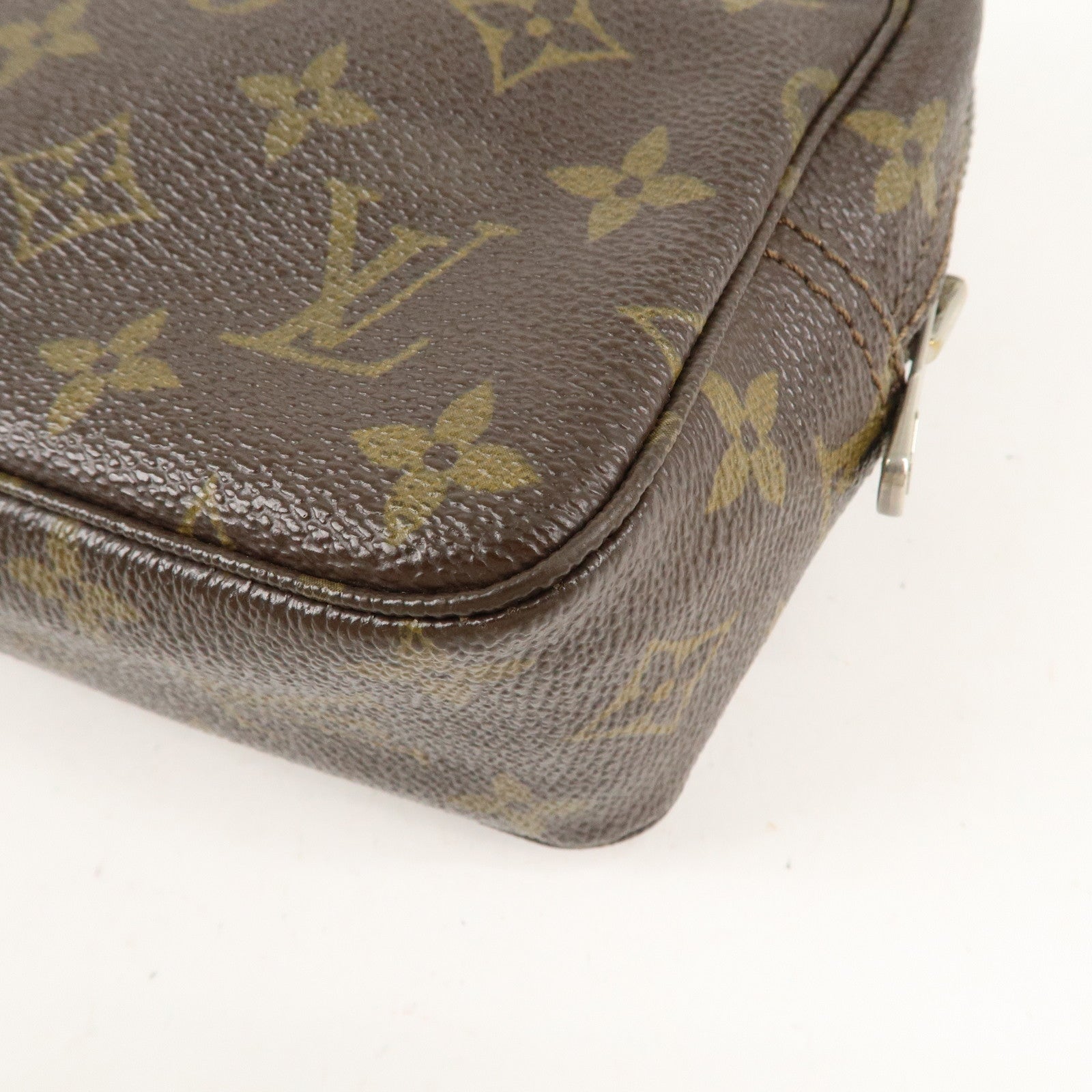 is Vuitton Monogram Trousse Toilette 23 Cosmetic Pouch M47524