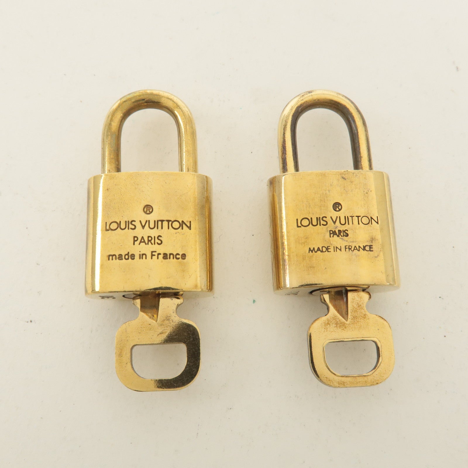 Louis Vuitton Set of 10 Lock 
Key Cadena Key Lock Gold