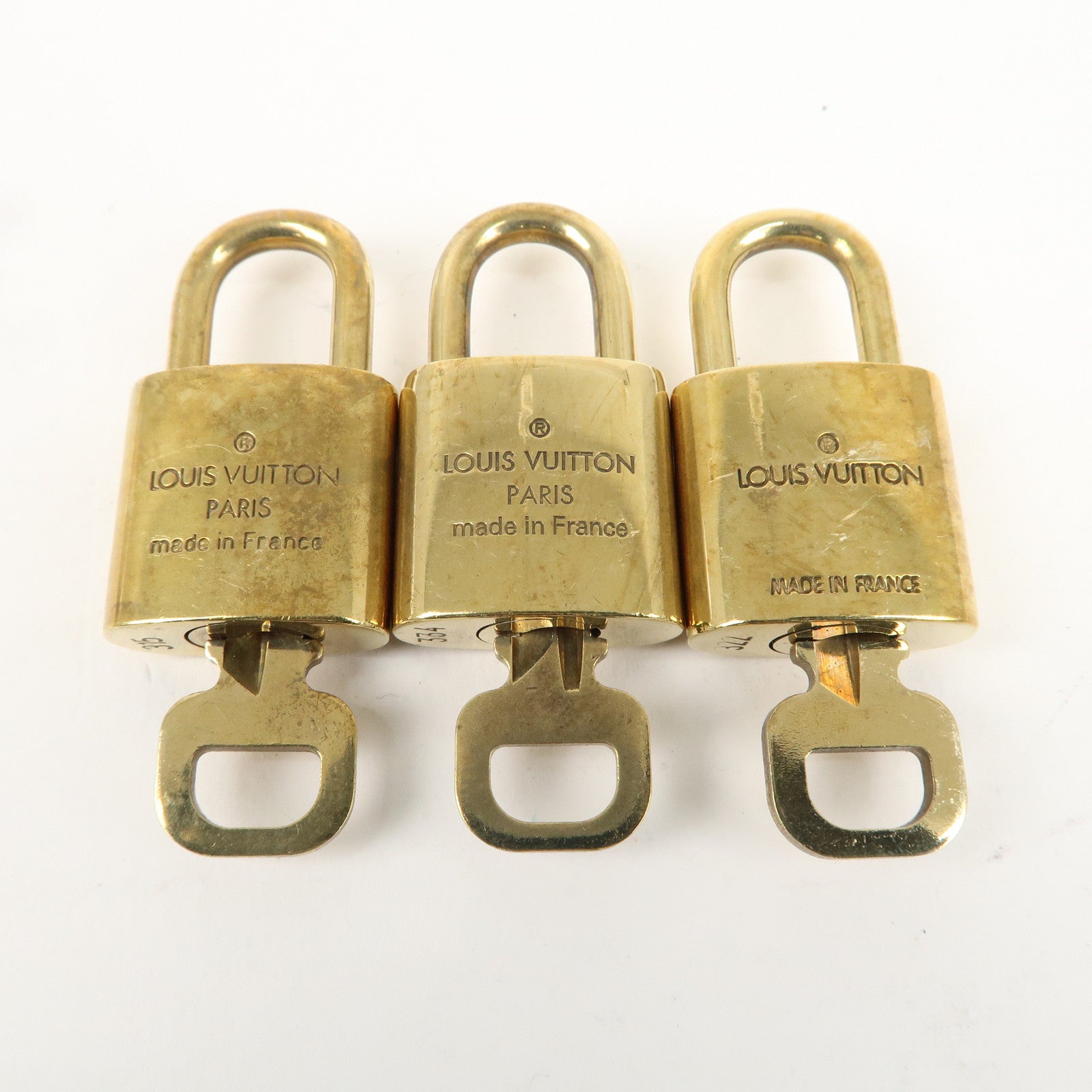 Louis Vuitton Set of 10 Lock 
Key Cadena Key Lock Gold