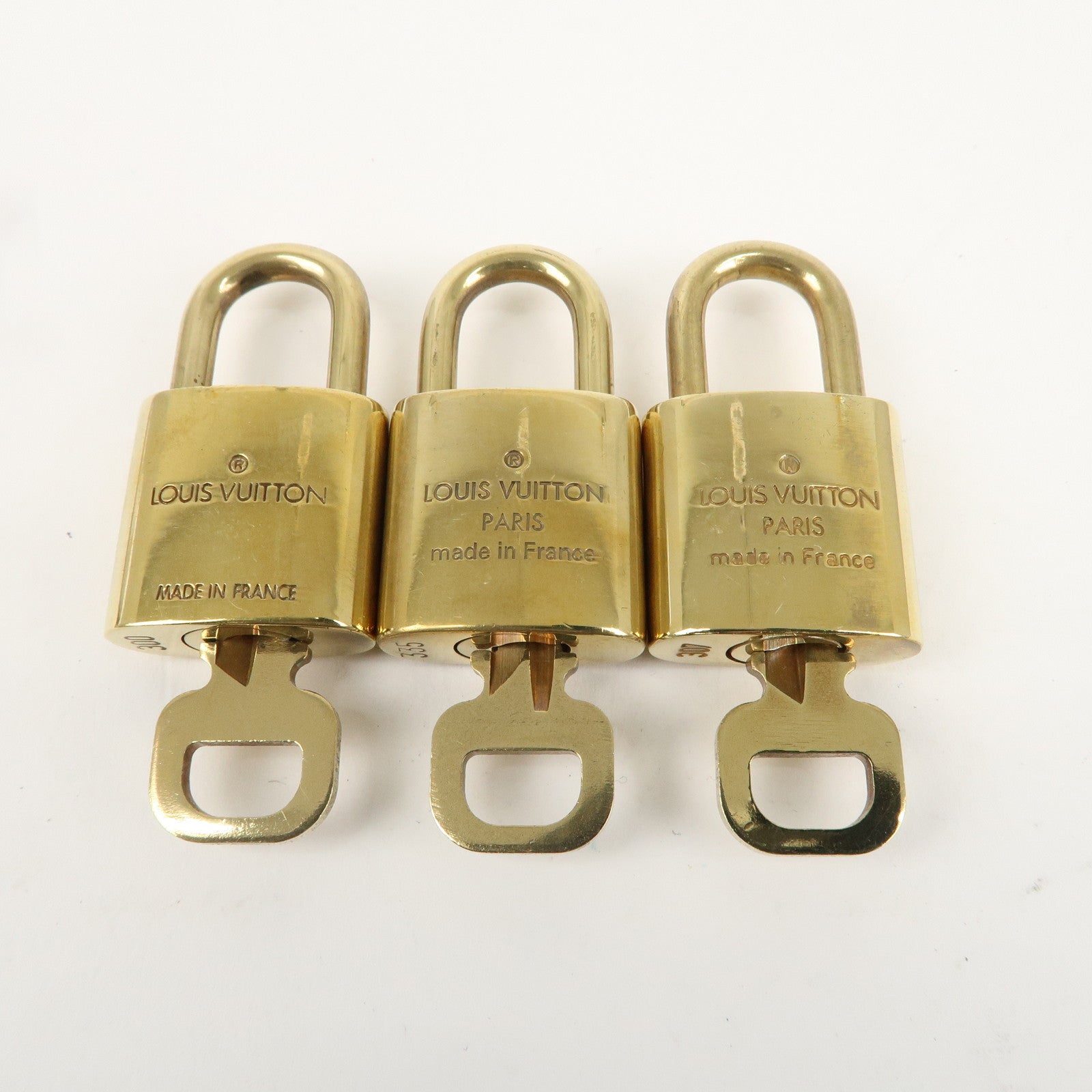 Louis Vuitton Set of 10 Lock 
Key Cadena Key Lock Gold