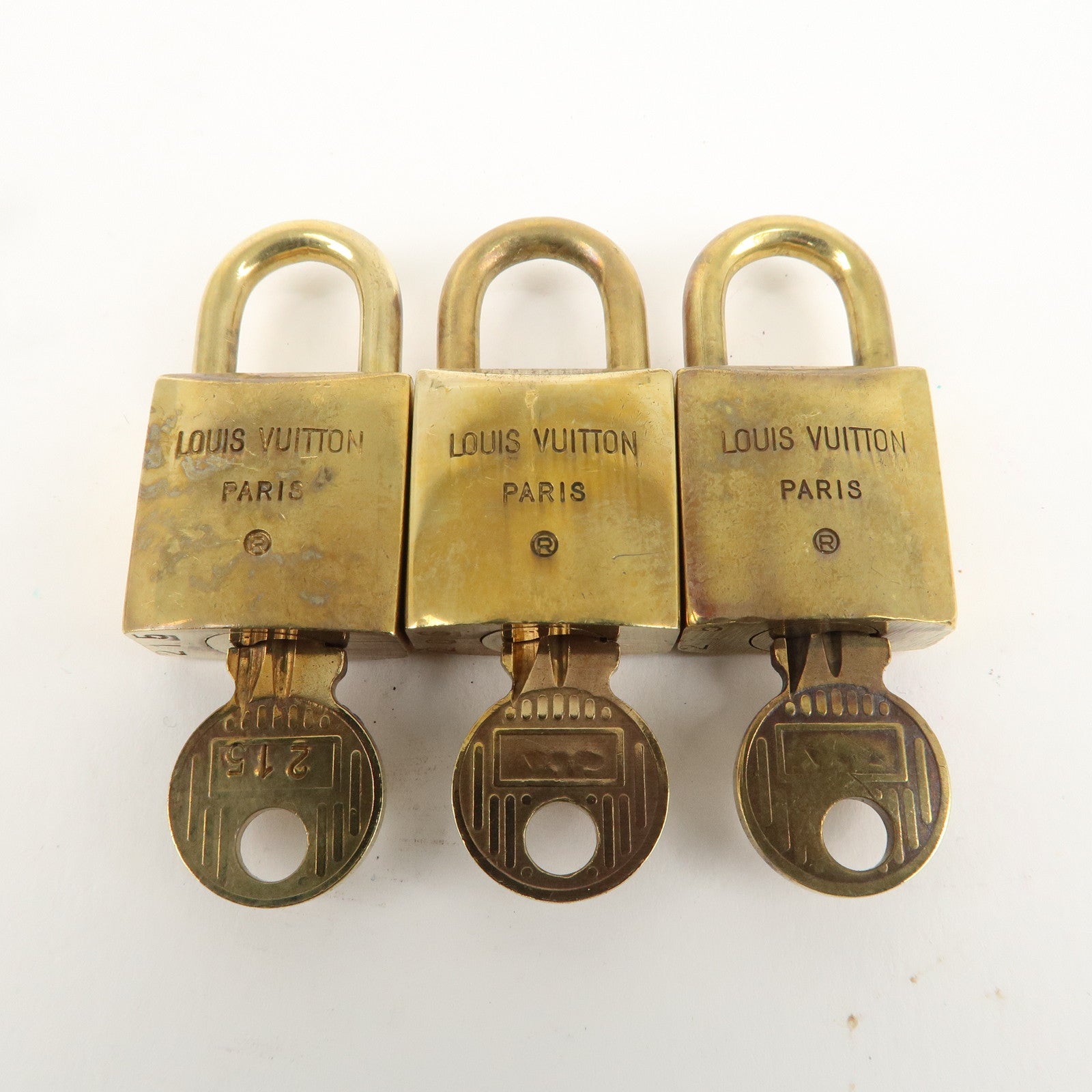 Louis Vuitton Set of 10 Lock 
Key Cadena Key Lock Gold