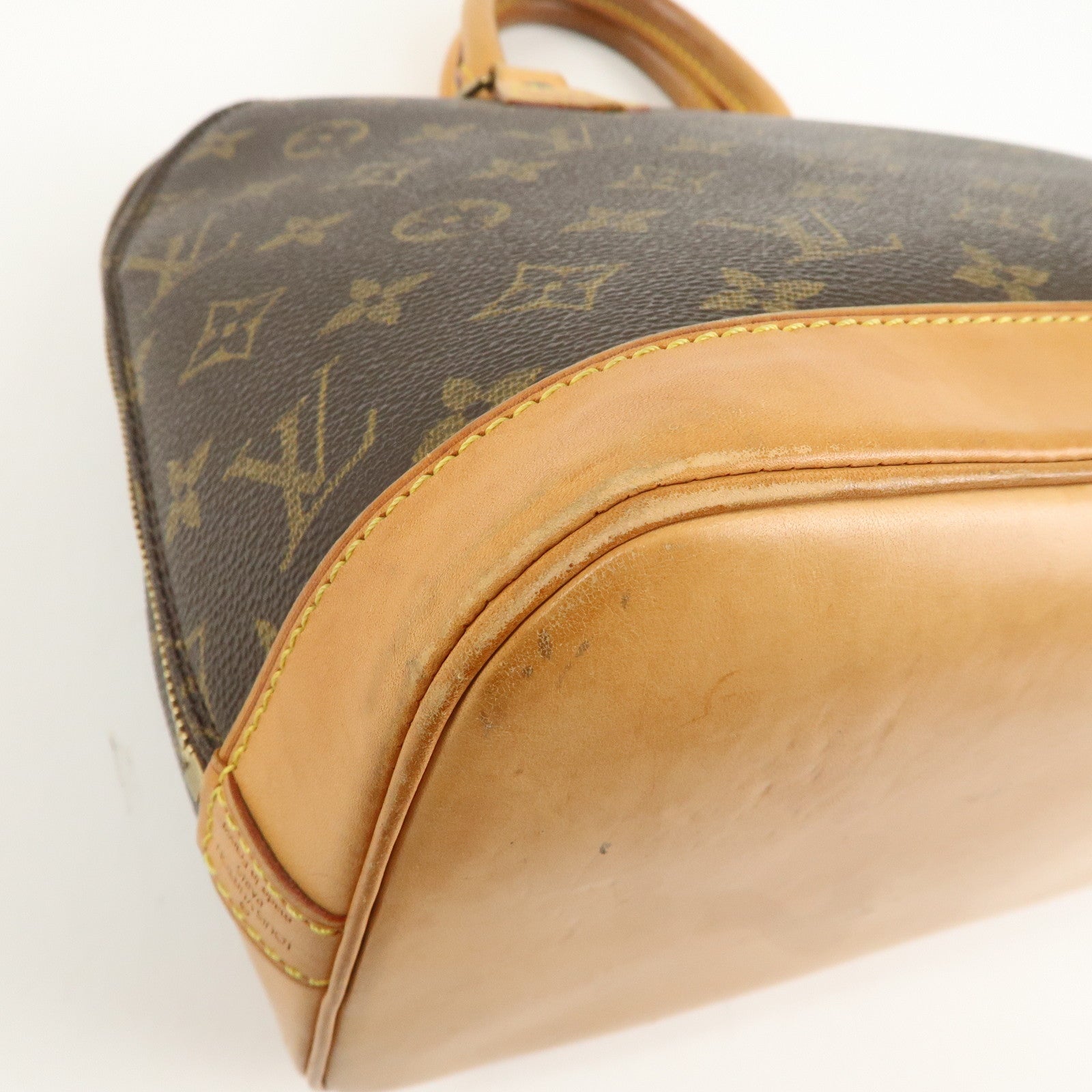 Louis Vuitton Monogram Alma Hand Bag Brown M51130