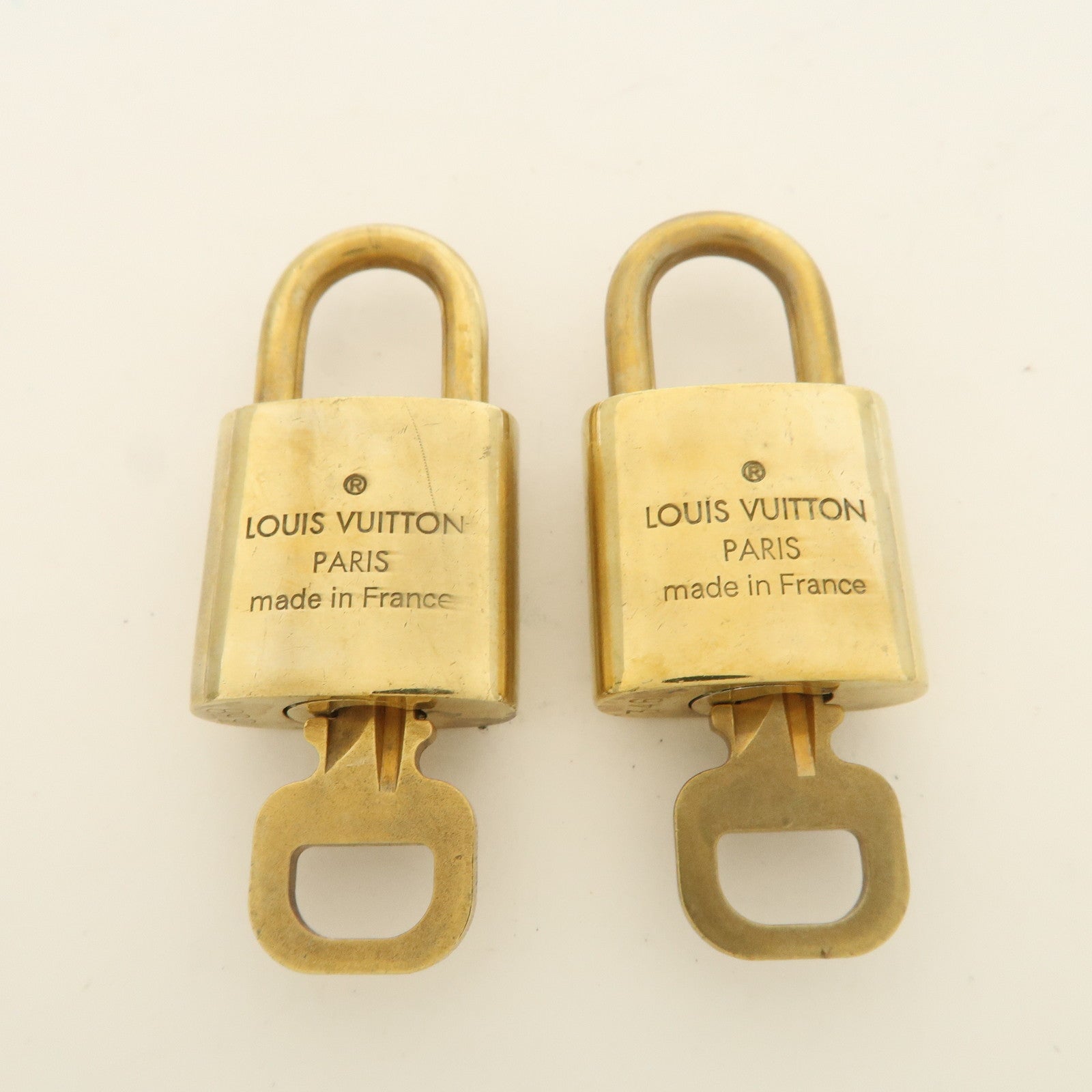 Louis Vuitton Set of 10 Lock 
Key Cadena Key Lock Used