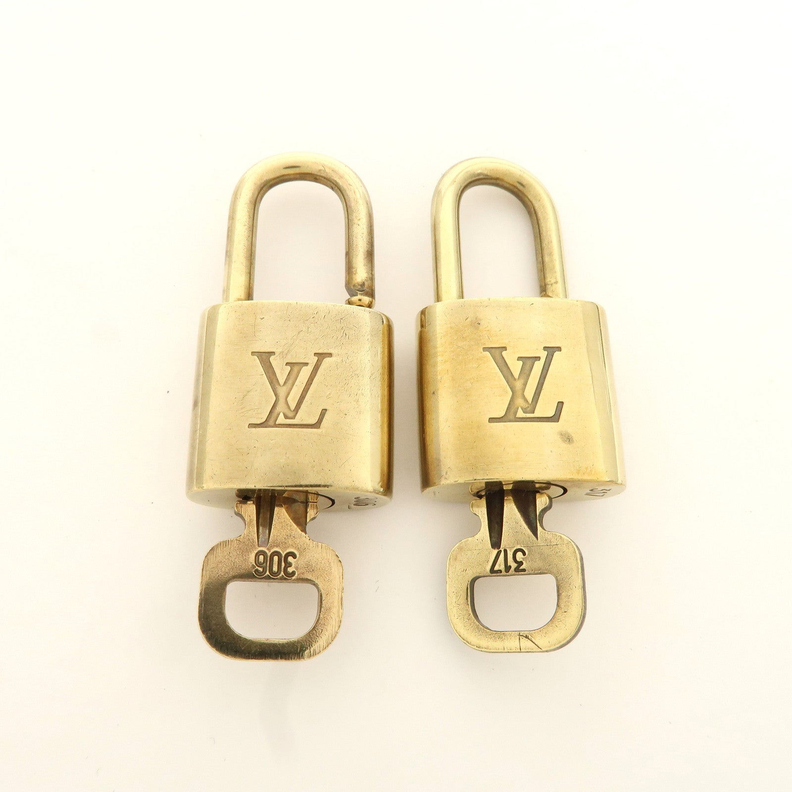 Louis Vuitton Set of 10 Lock 
Key Cadena Key Lock