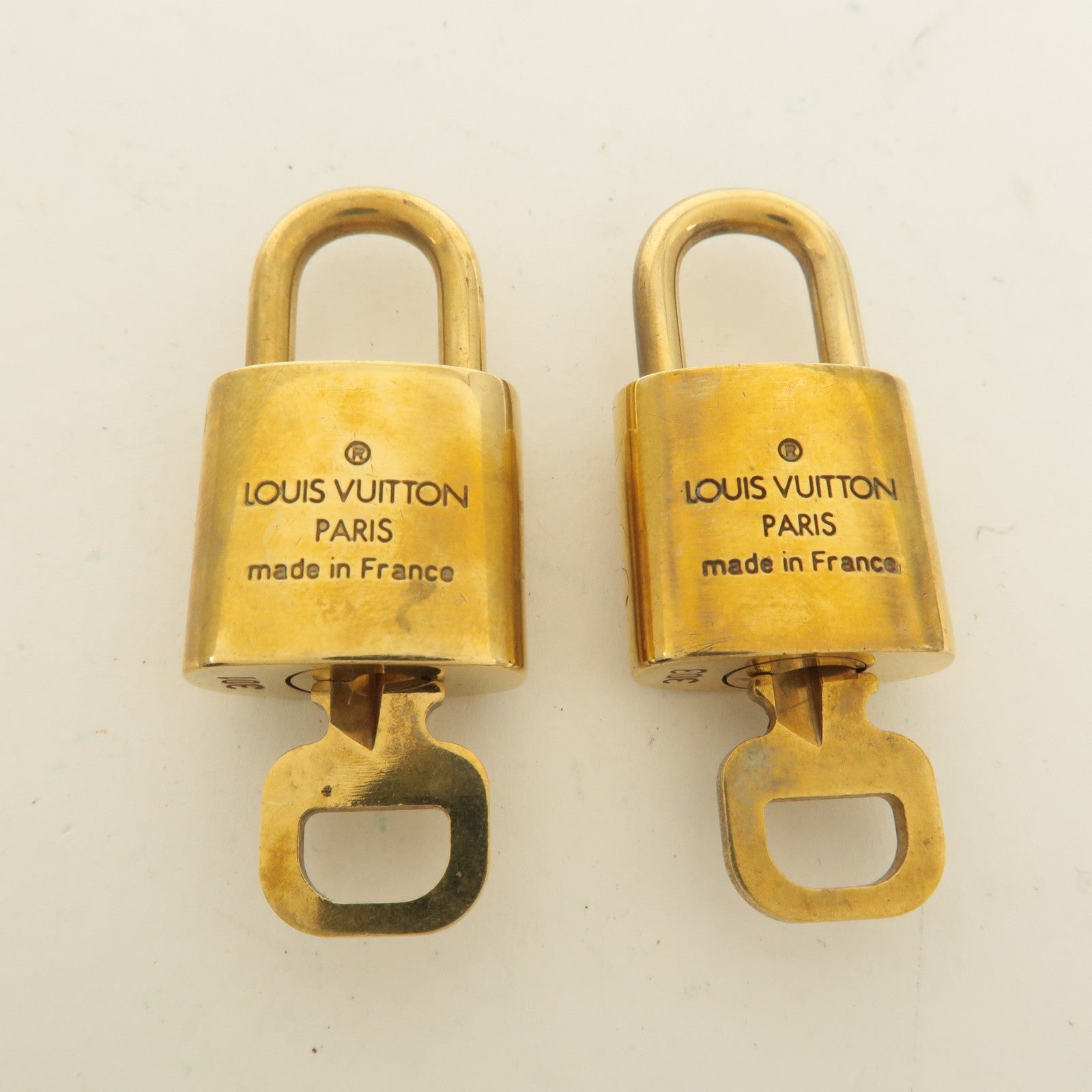 Louis Vuitton Set of 10 Lock 
Key Cadena Key Lock Gold