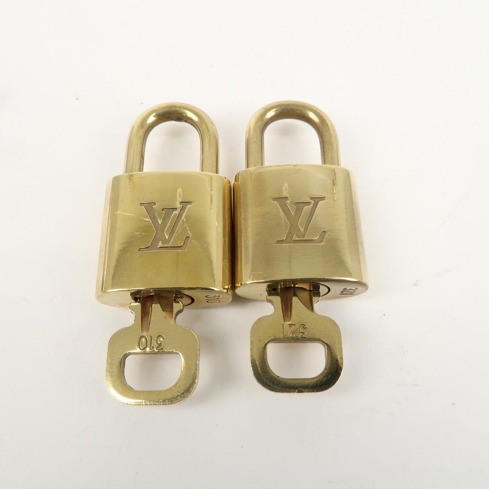 Louis Vuitton Set of 10 Lock 
Key Cadena Key Lock Gold