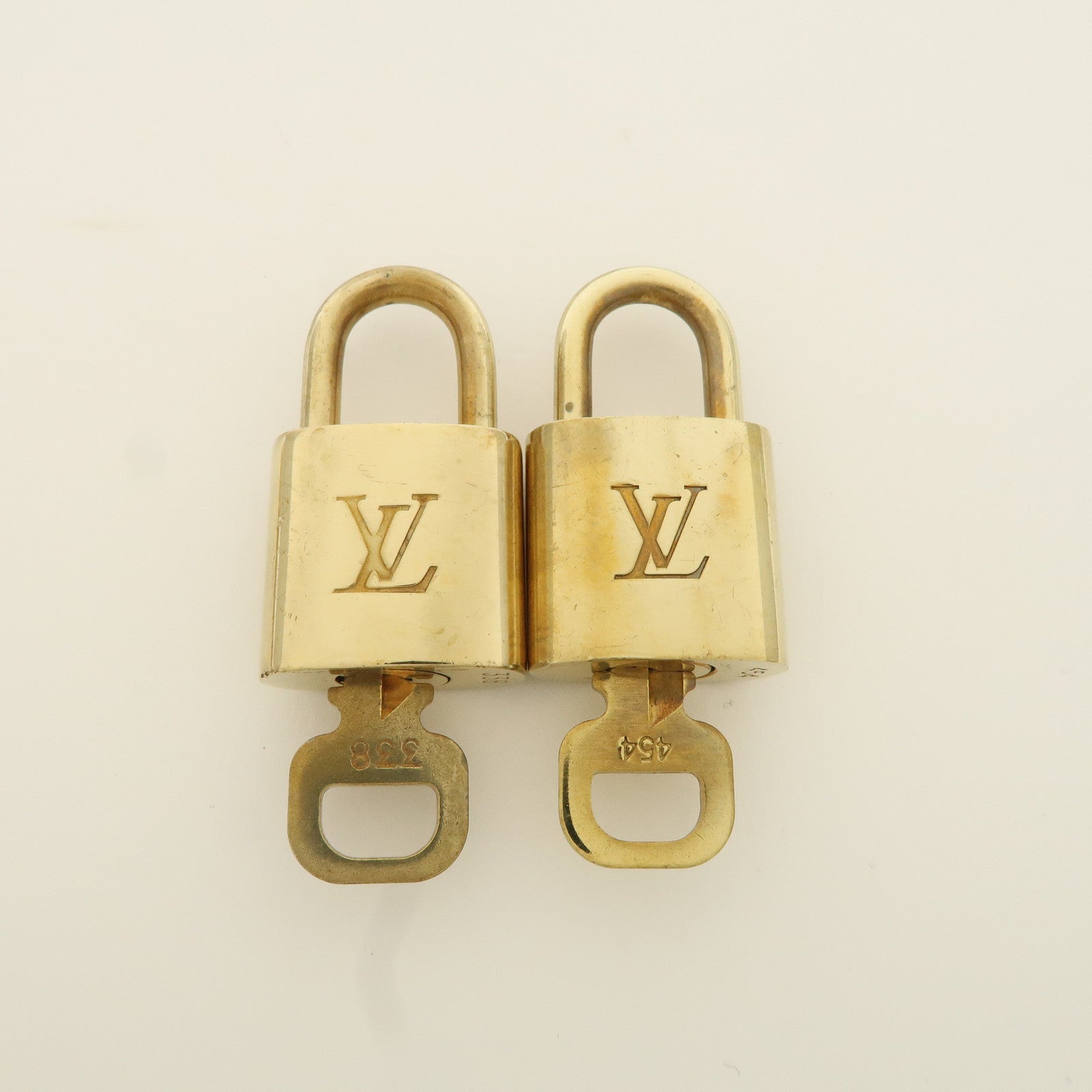 Louis Vuitton Set of 10 Lock 
Key Cadena Key Lock Metal Gold Used