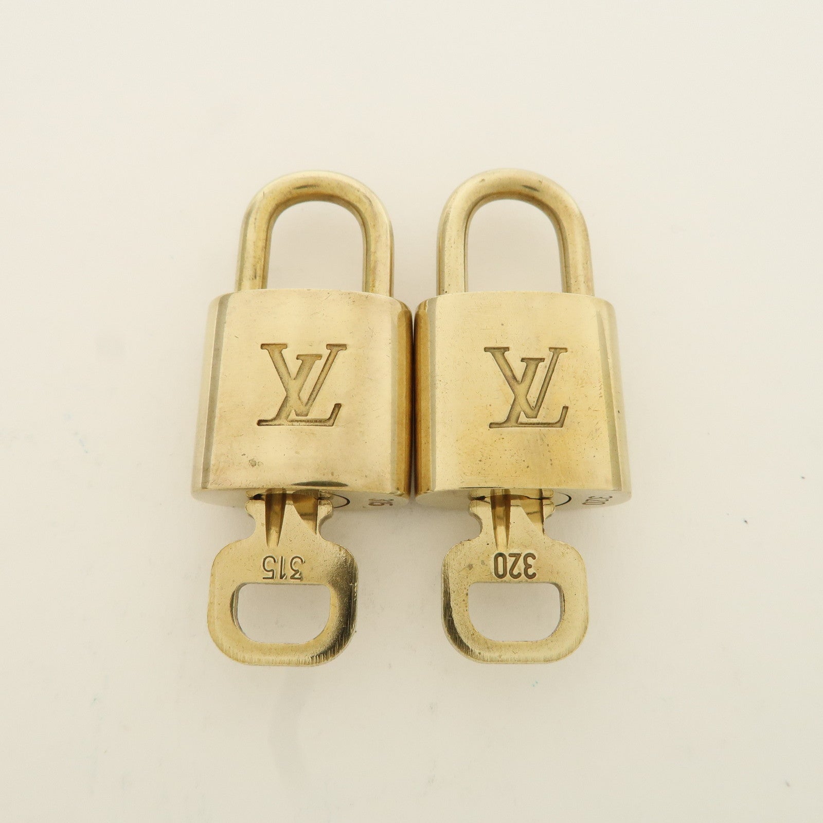 Louis Vuitton Set of 10 Lock 
Key Cadena Key Lock Metal Gold Used