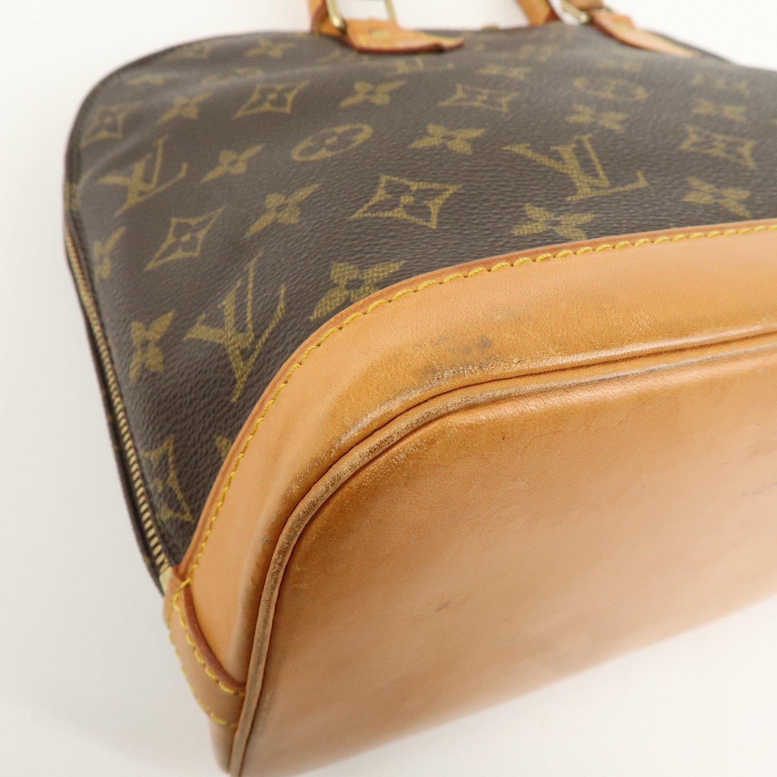 Louis Vuitton Monogram Alma Hand Bag Brown M51130