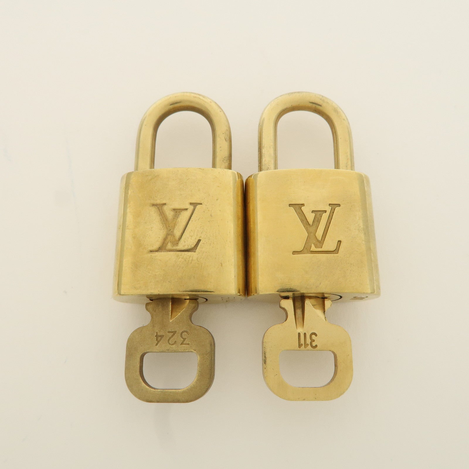 Louis Vuitton Set of 10 Lock 
Key Cadena Key Lock Metal Gold Used