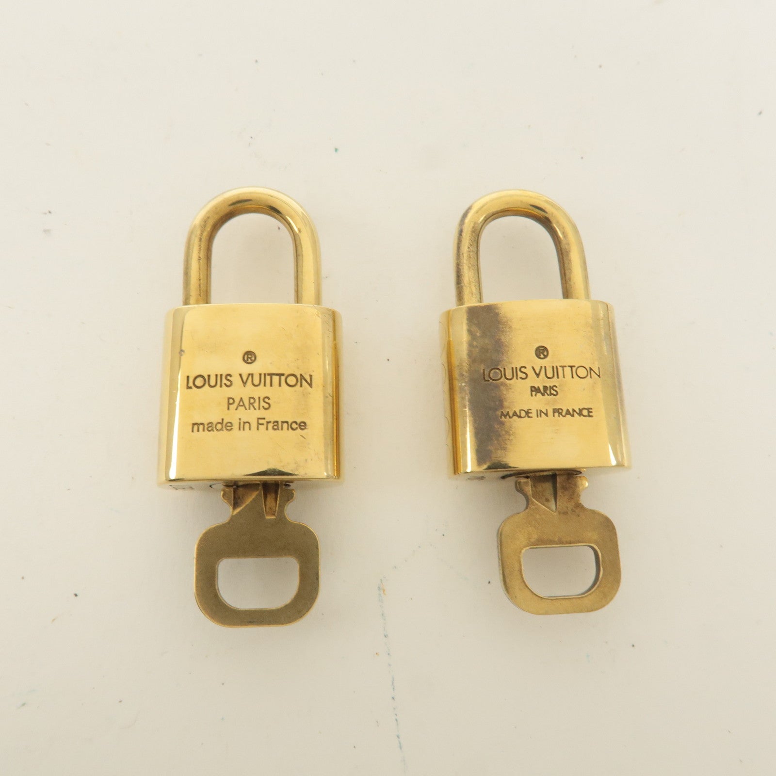 Louis Vuitton Set of 10 Lock 
Key Cadena Key Lock Gold