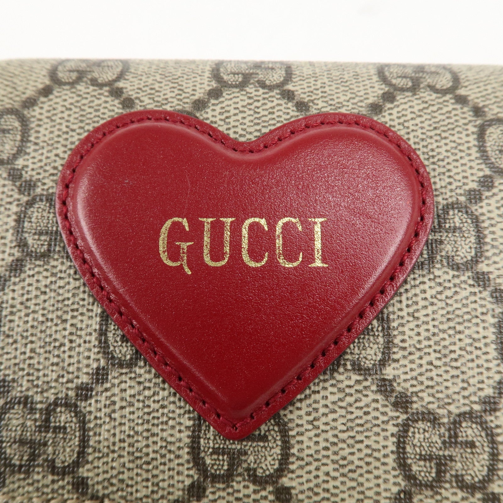 GUCCI GG Supreme Leather Heart Motif Bi-fold Wallet 648848