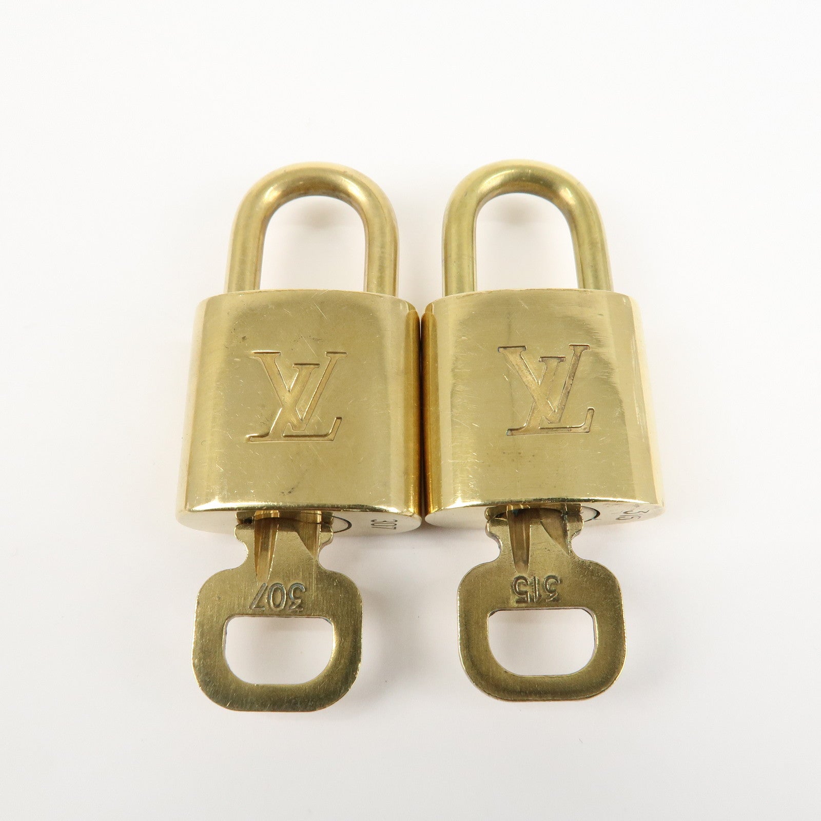 Louis Vuitton Set of 10 Lock 
Key Cadena Key Lock Metal Gold Used