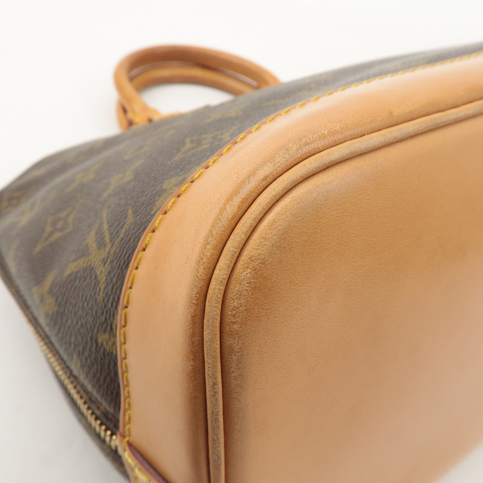 Louis Vuitton Monogram Alma Hand Bag Brown M51130