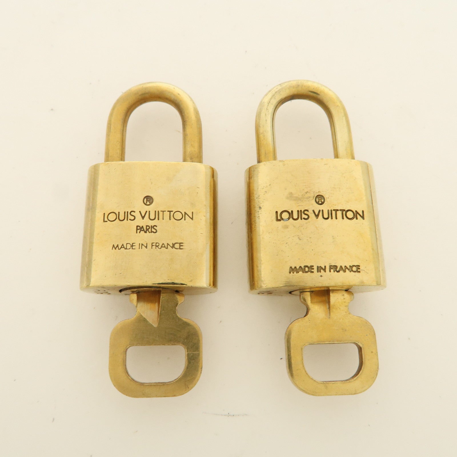 Louis Vuitton Set of 10 Lock 
Key Cadena Key Lock Used