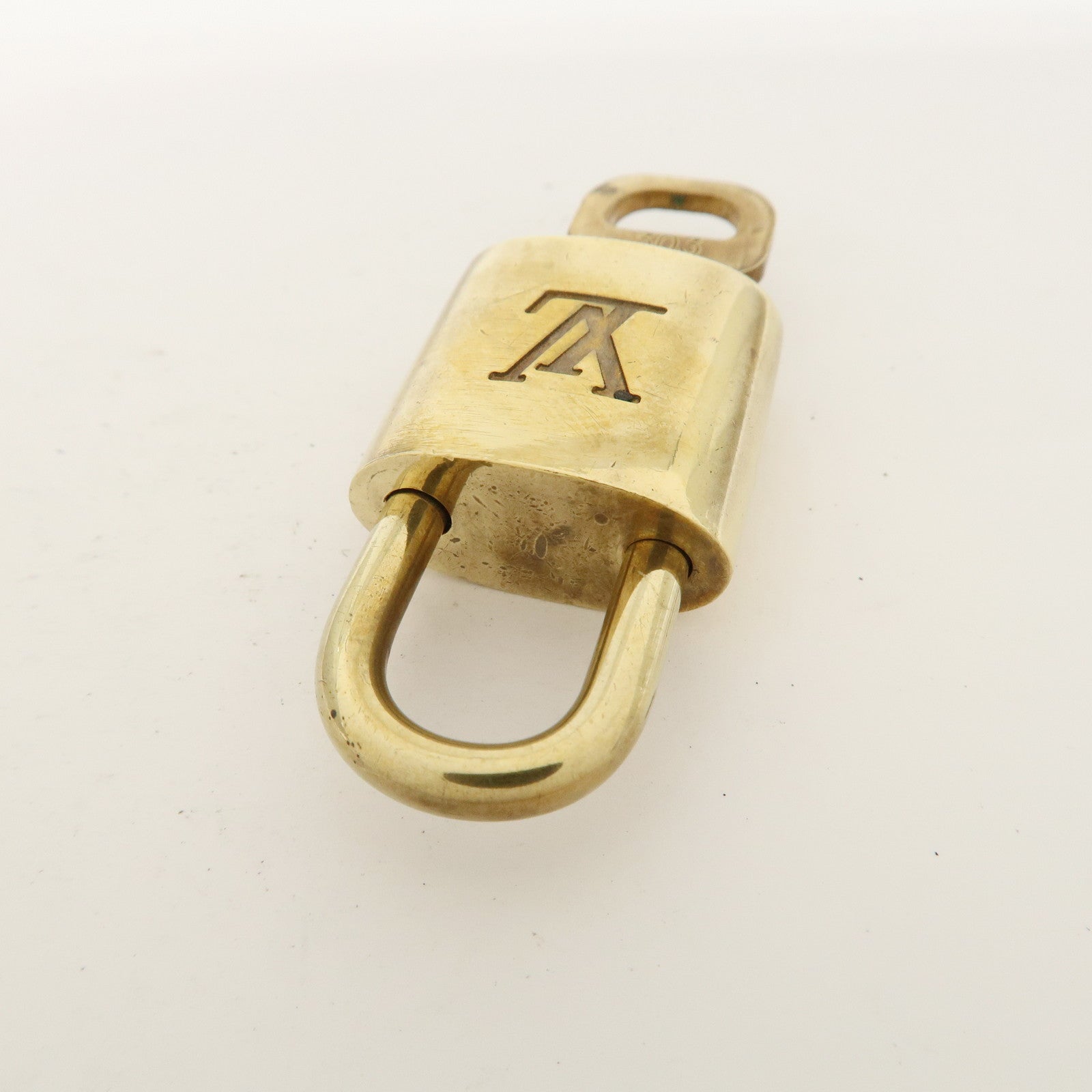 Louis Vuitton Set of 10 Lock 
Key Cadena Key Lock Metal Gold