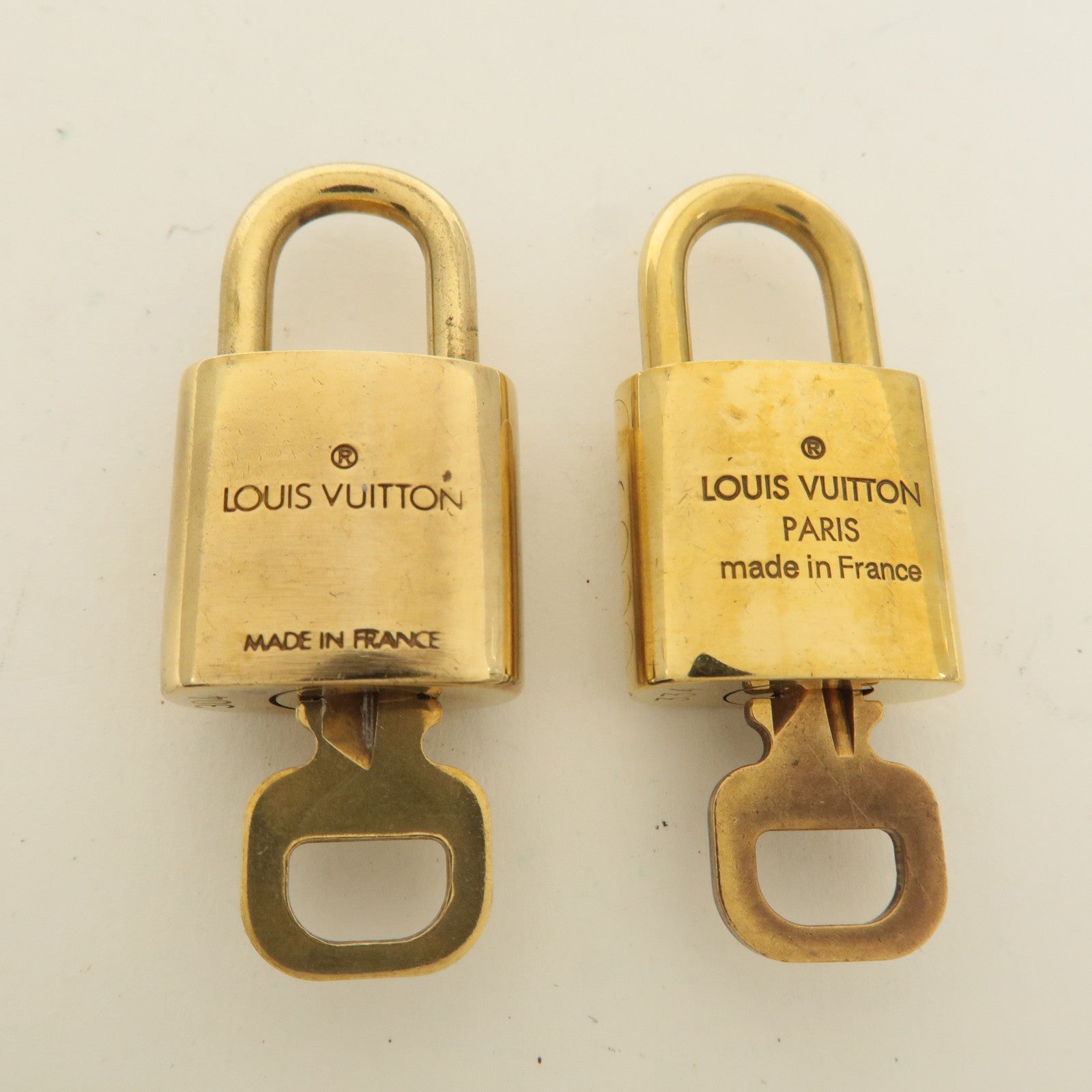 Louis Vuitton Set of 10 Lock 
Key Cadena Key Lock Gold