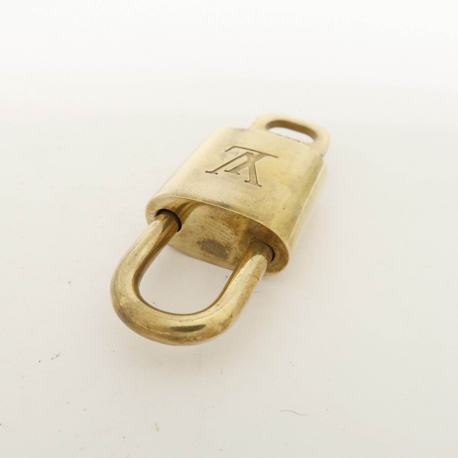 Louis Vuitton Set of 10 Lock 
Key Cadena Key Lock Metal Gold