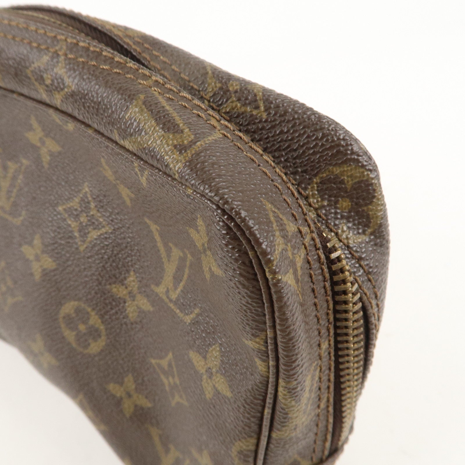 is Vuitton Monogram Trousse Toilette 23 Cosmetic Pouch M47524