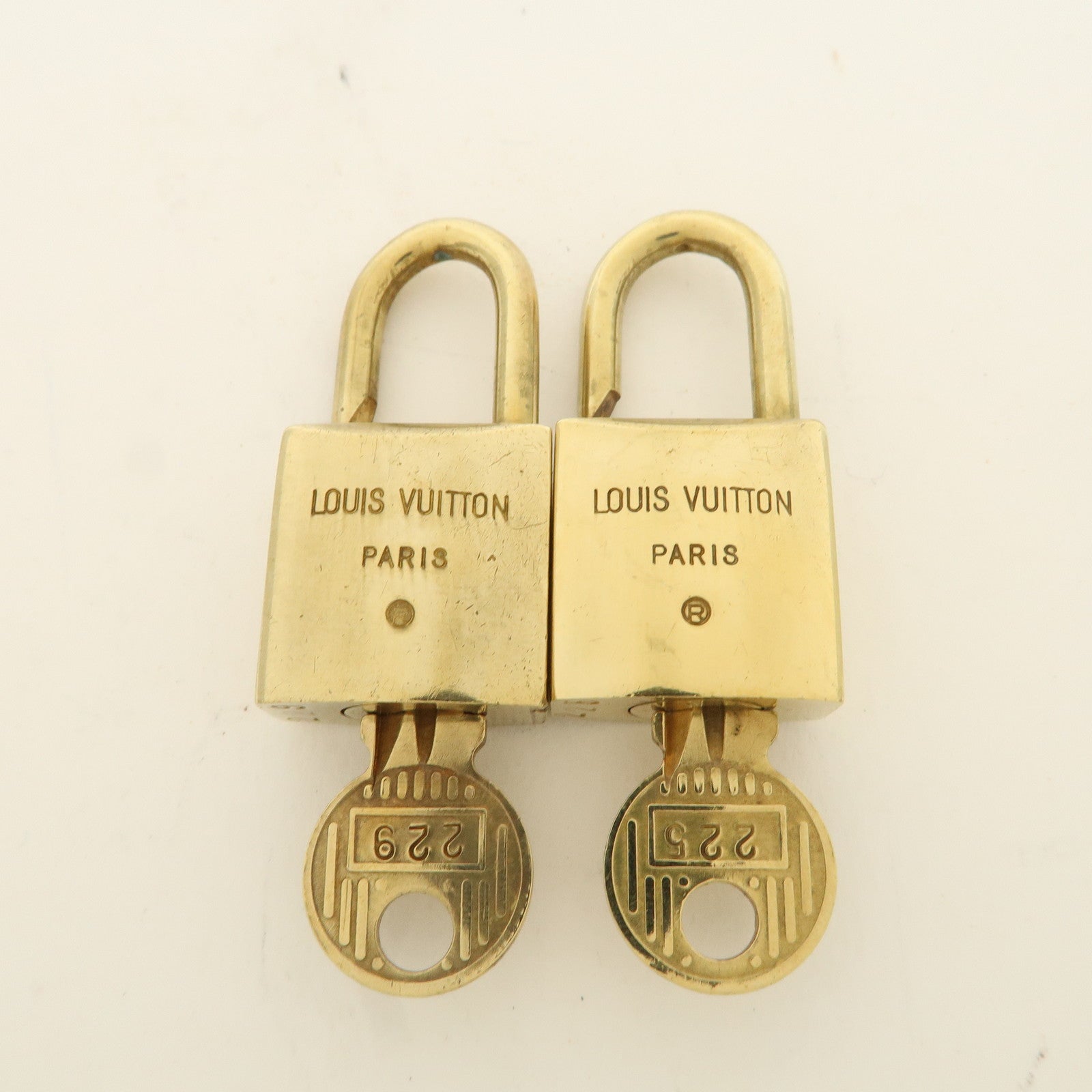 Louis Vuitton Set of 10 Lock 
Key Cadena Key Lock Used