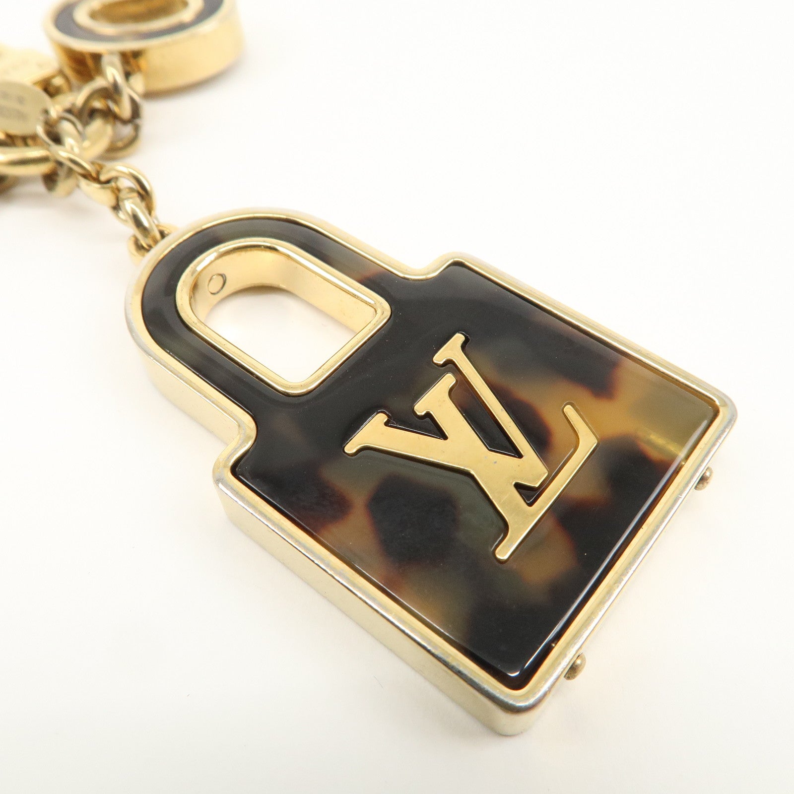 Louis Vuitton Porte Cles Confidence Bag Charm Gold M65088