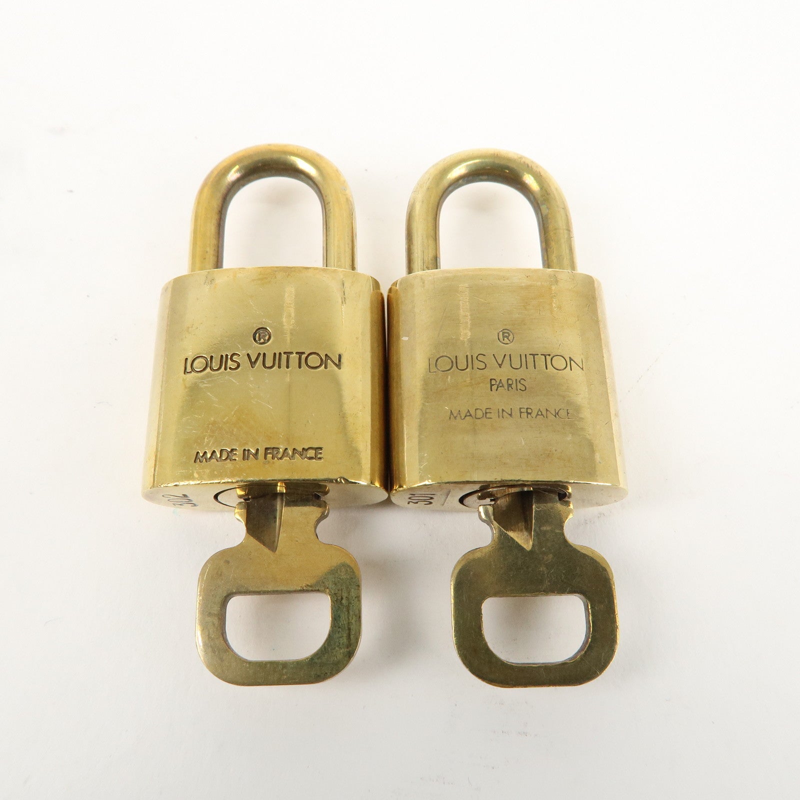 Louis Vuitton Set of 10 Lock 
Key Cadena Key Lock Gold