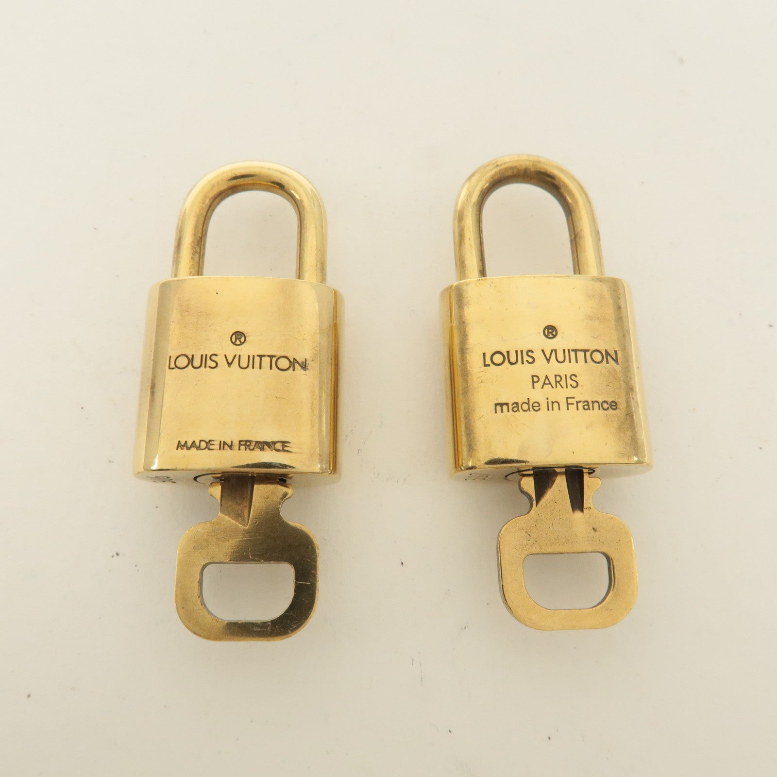 Louis Vuitton Set of 10 Lock 
Key Cadena Key Lock Gold