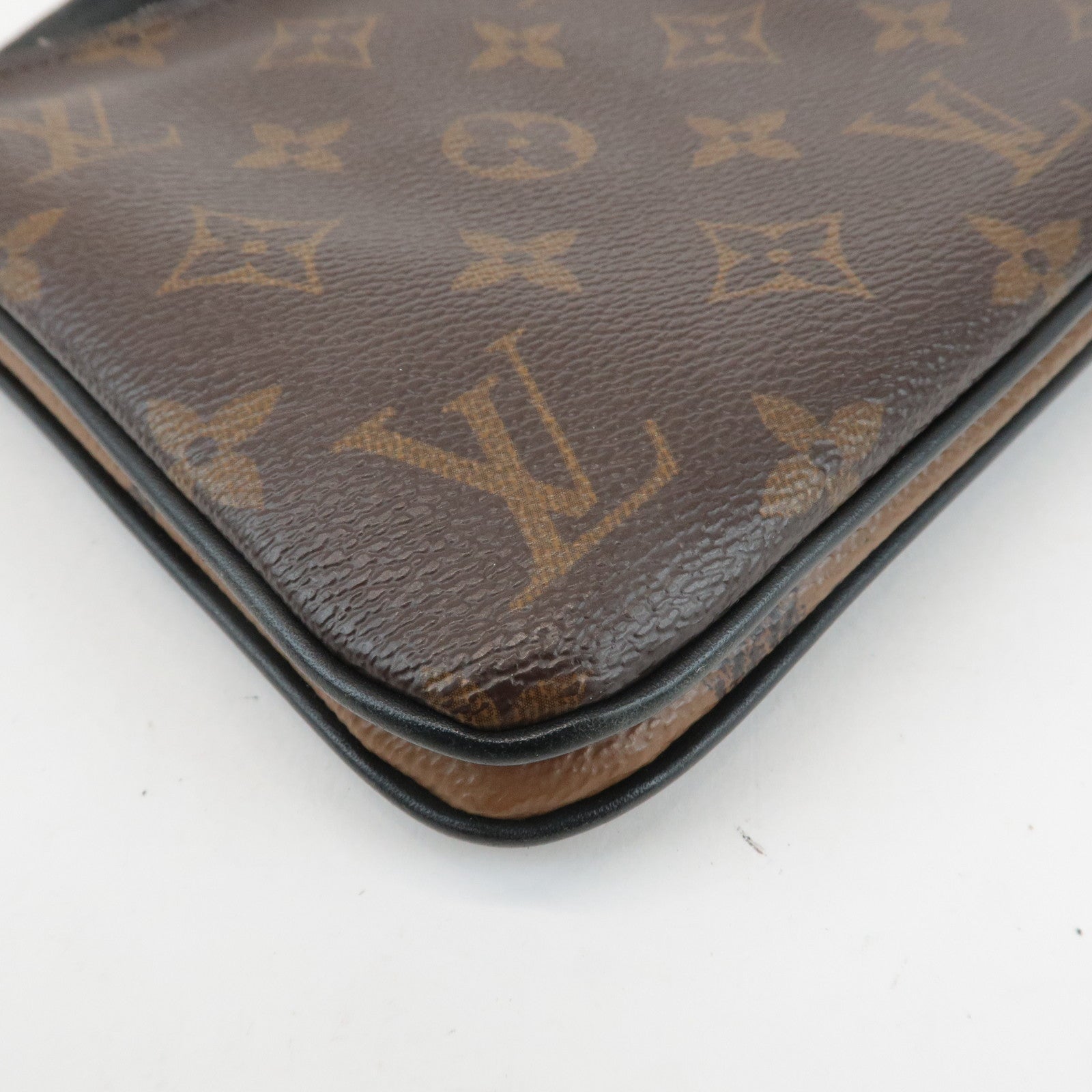 Louis Vuitton Monogram Reverse Pochette Double Zip Bag M69203