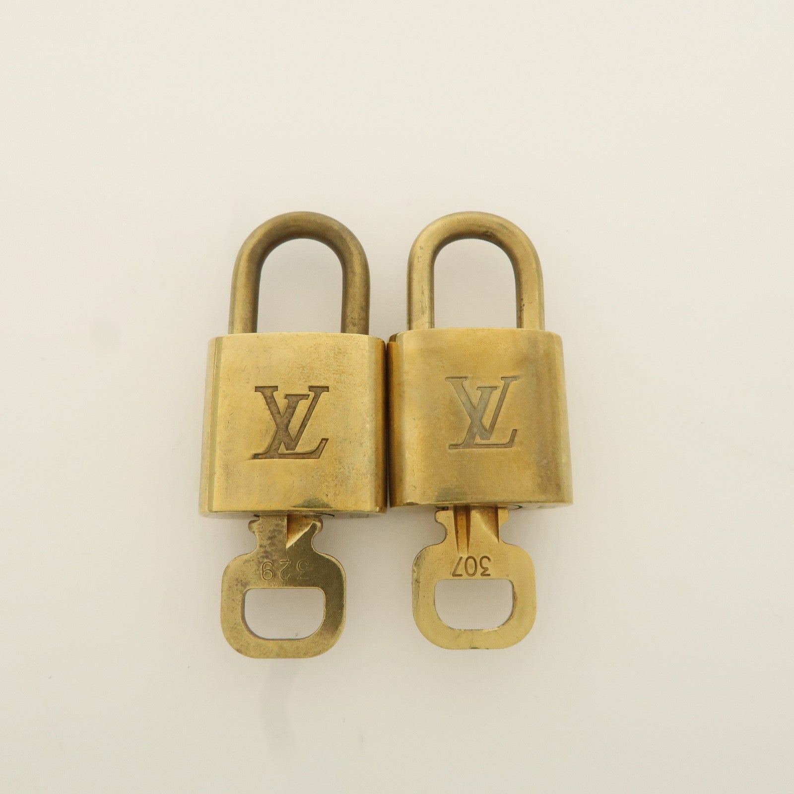 Louis Vuitton Set of 10 Lock 
Key Cadena Key Lock Metal Gold Used