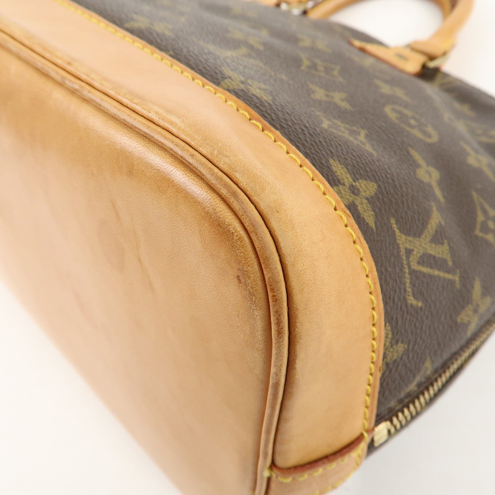 Louis Vuitton Monogram Alma Hand Bag Brown M51130