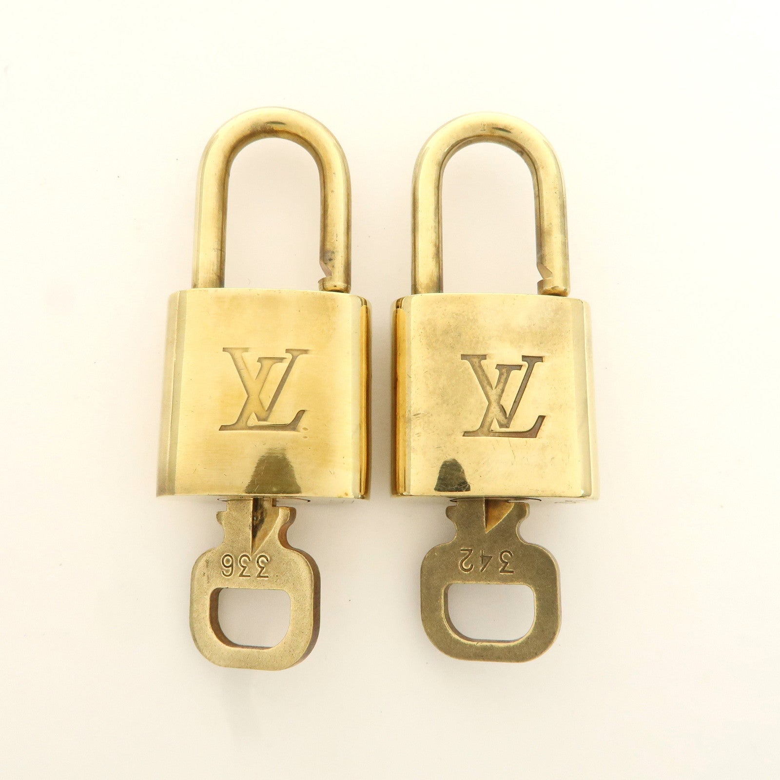 Louis Vuitton Set of 10 Lock 
Key Cadena Key Lock