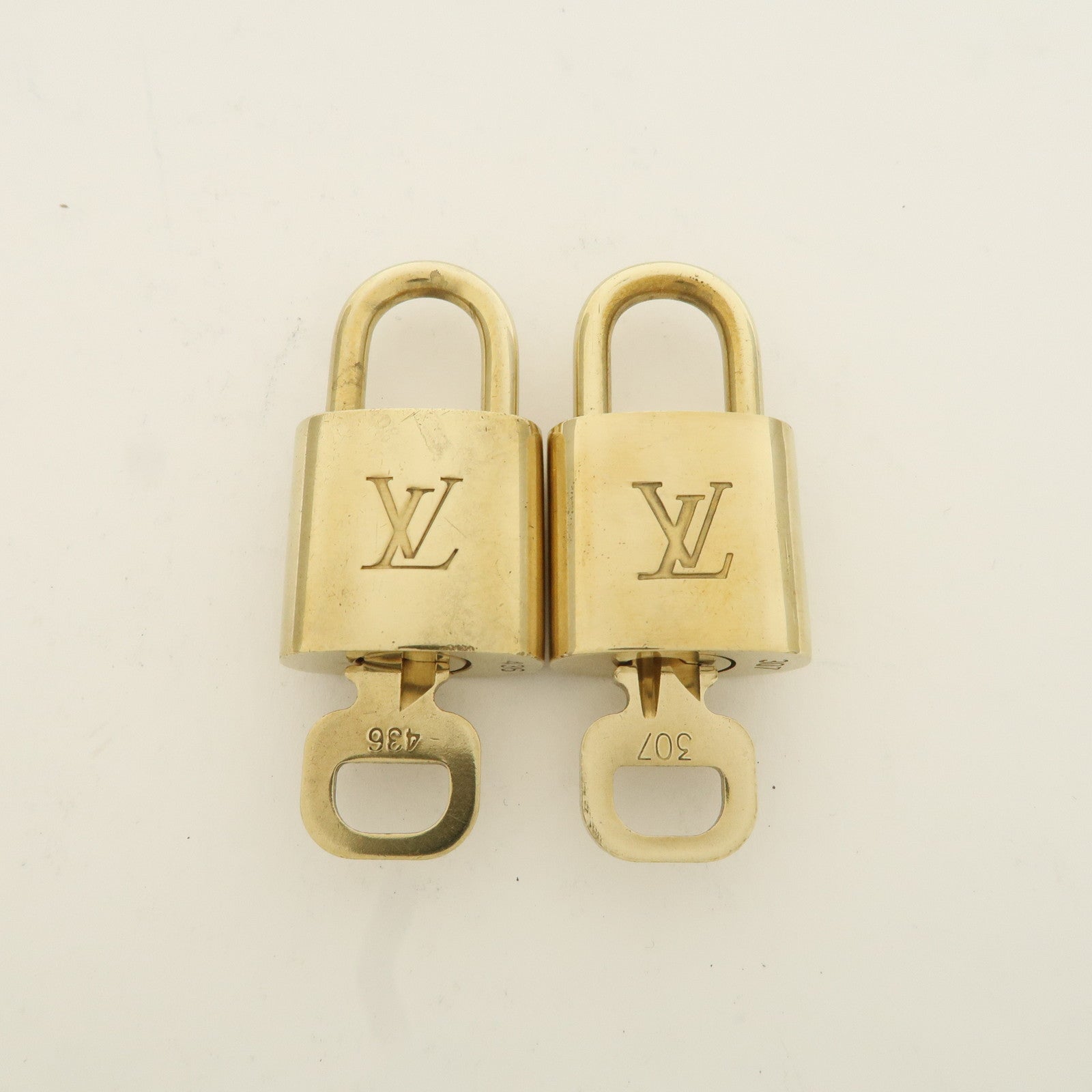 Louis Vuitton Set of 10 Lock 
Key Cadena Key Lock Metal Gold Used