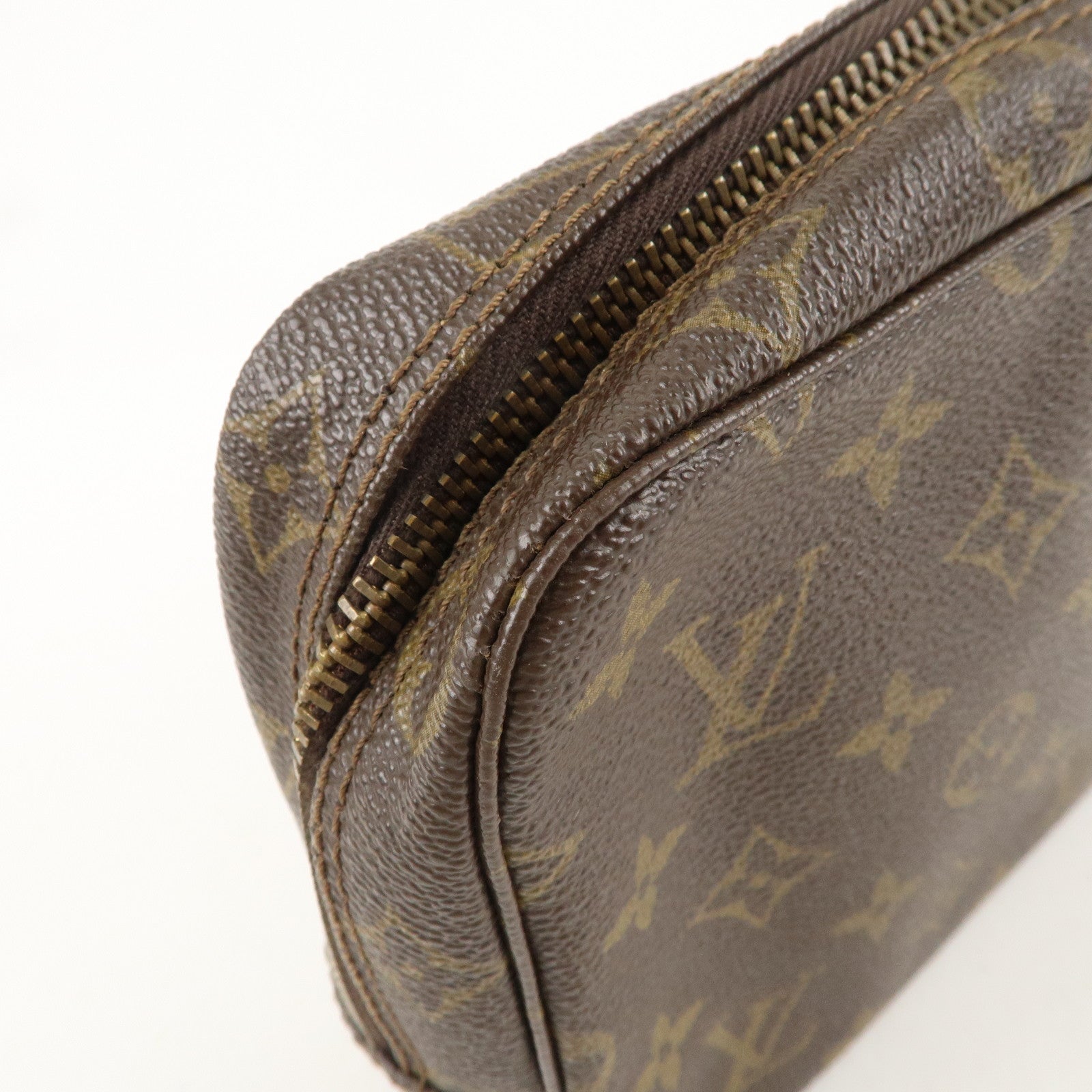 is Vuitton Monogram Trousse Toilette 23 Cosmetic Pouch M47524