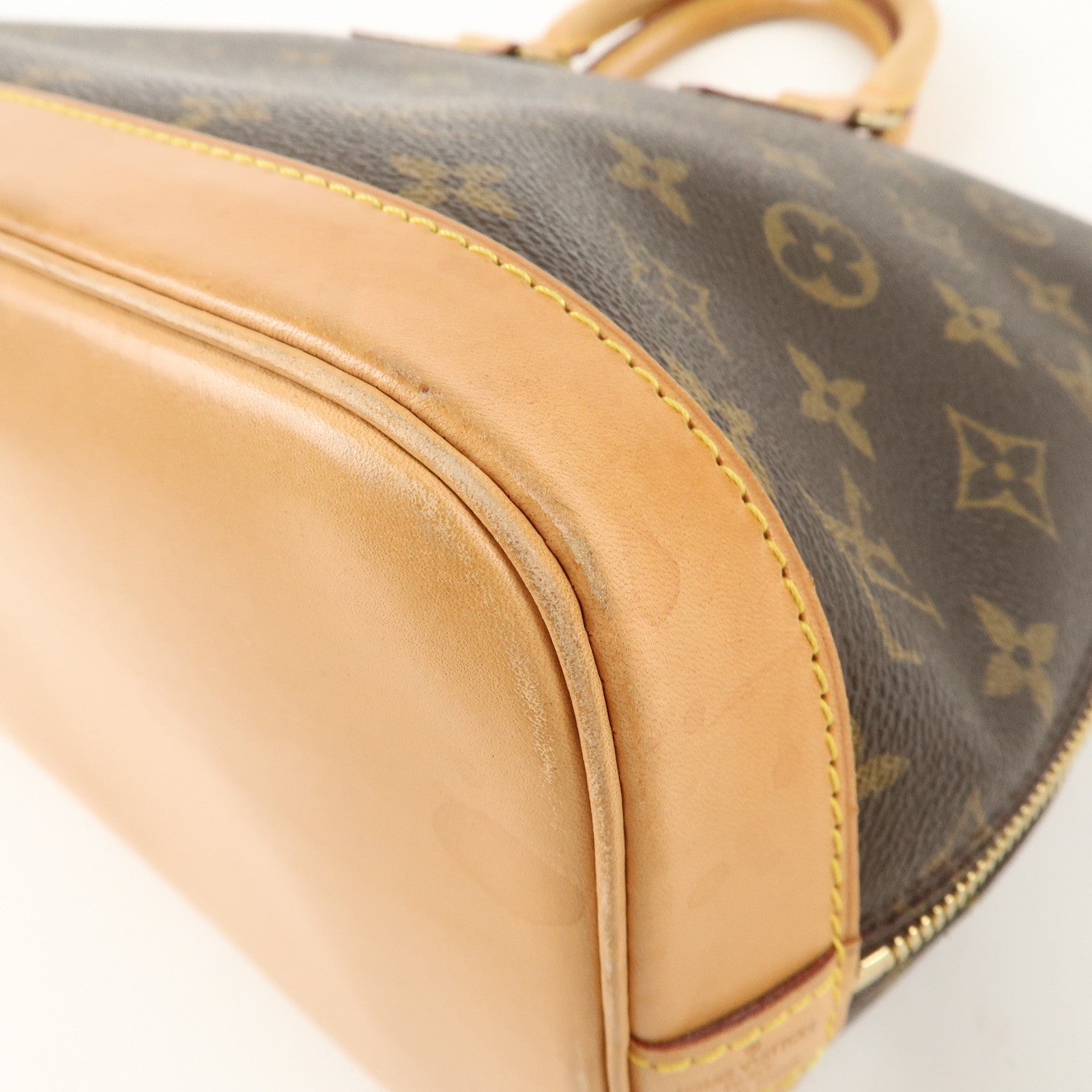 Louis Vuitton Monogram Alma Hand Bag Brown M51130