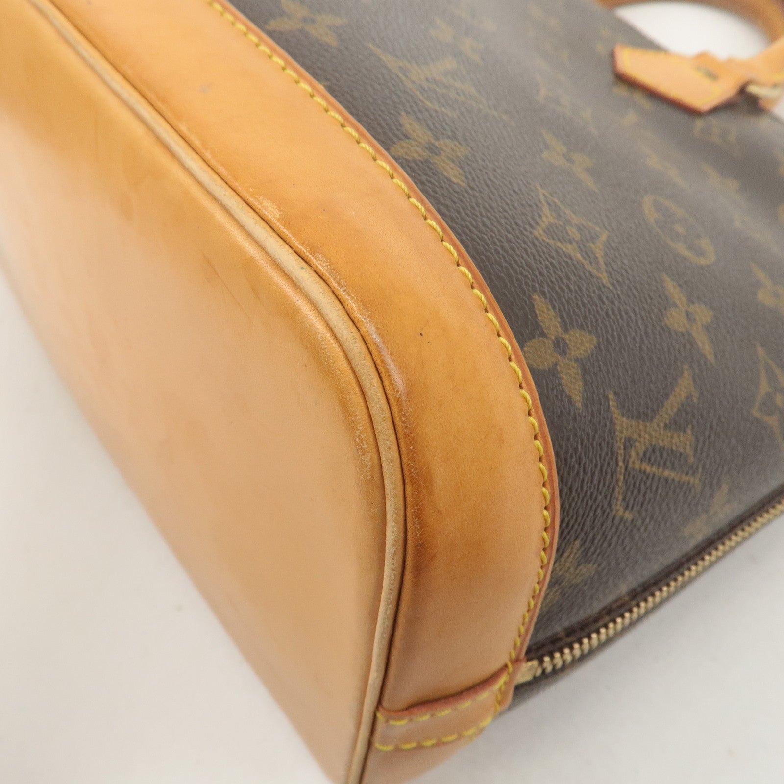 Louis Vuitton Monogram Alma Hand Bag Brown M51130