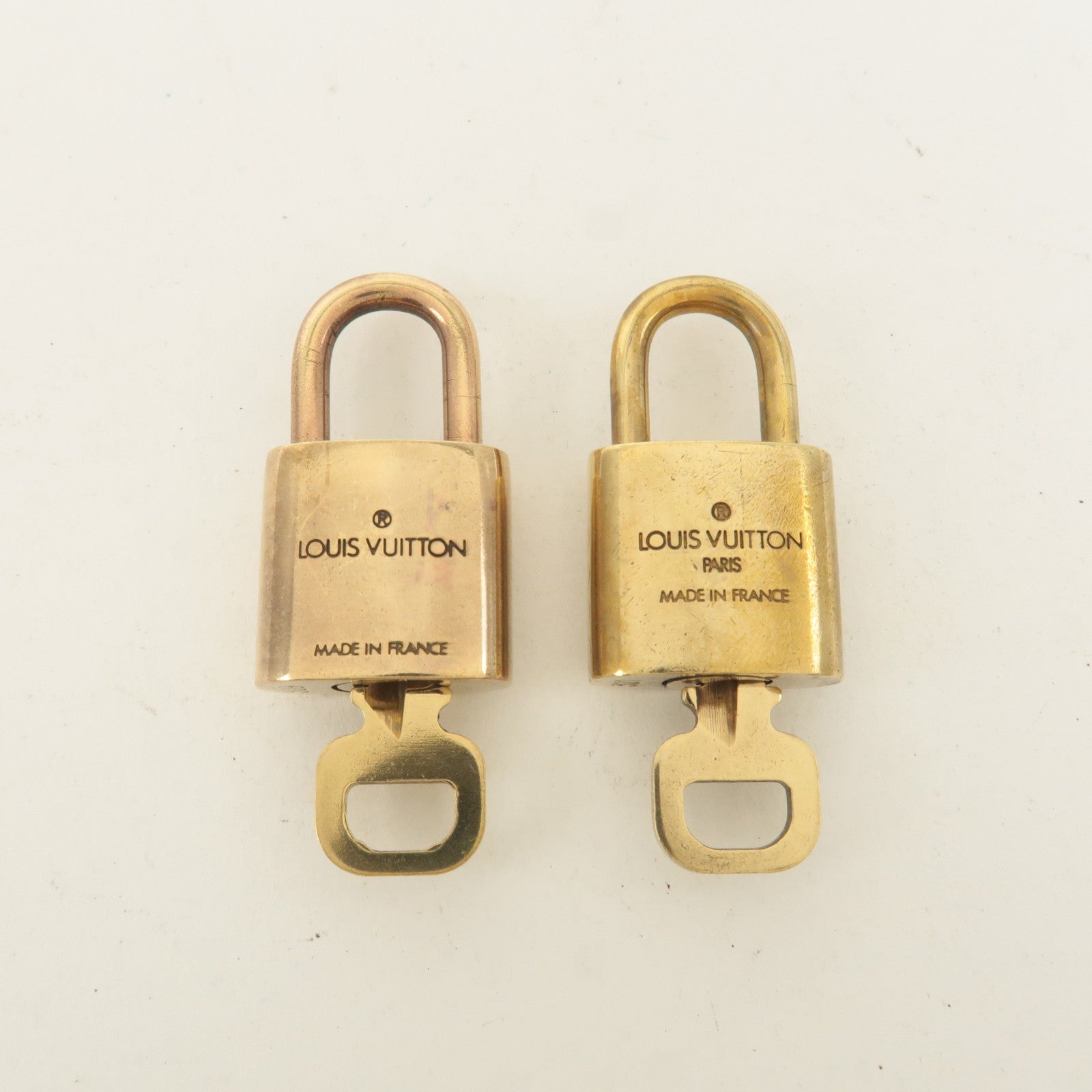 Louis Vuitton Set of 10 Lock 
Key Cadena Key Lock Gold