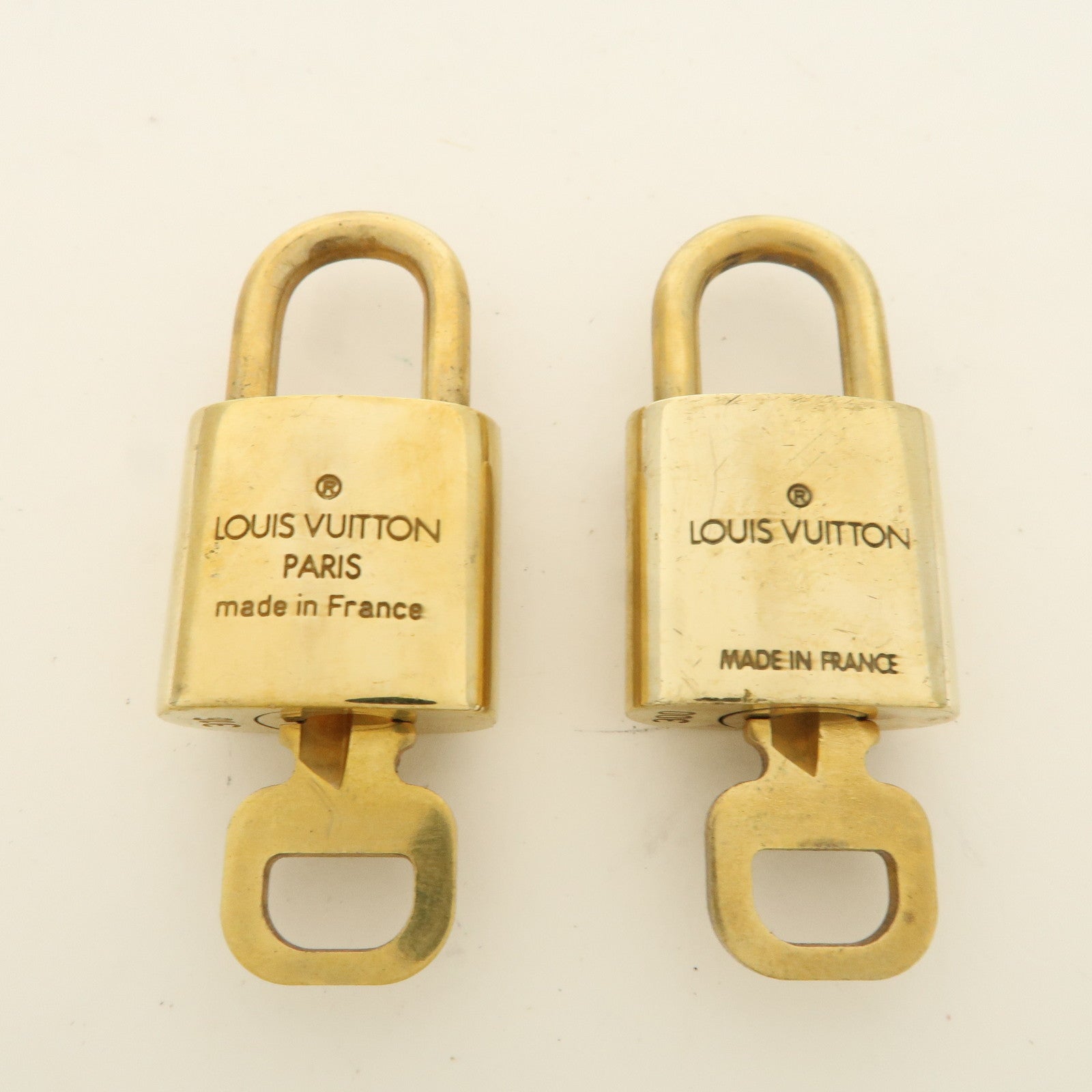 Louis Vuitton Set of 10 Lock 
Key Cadena Key Lock Used