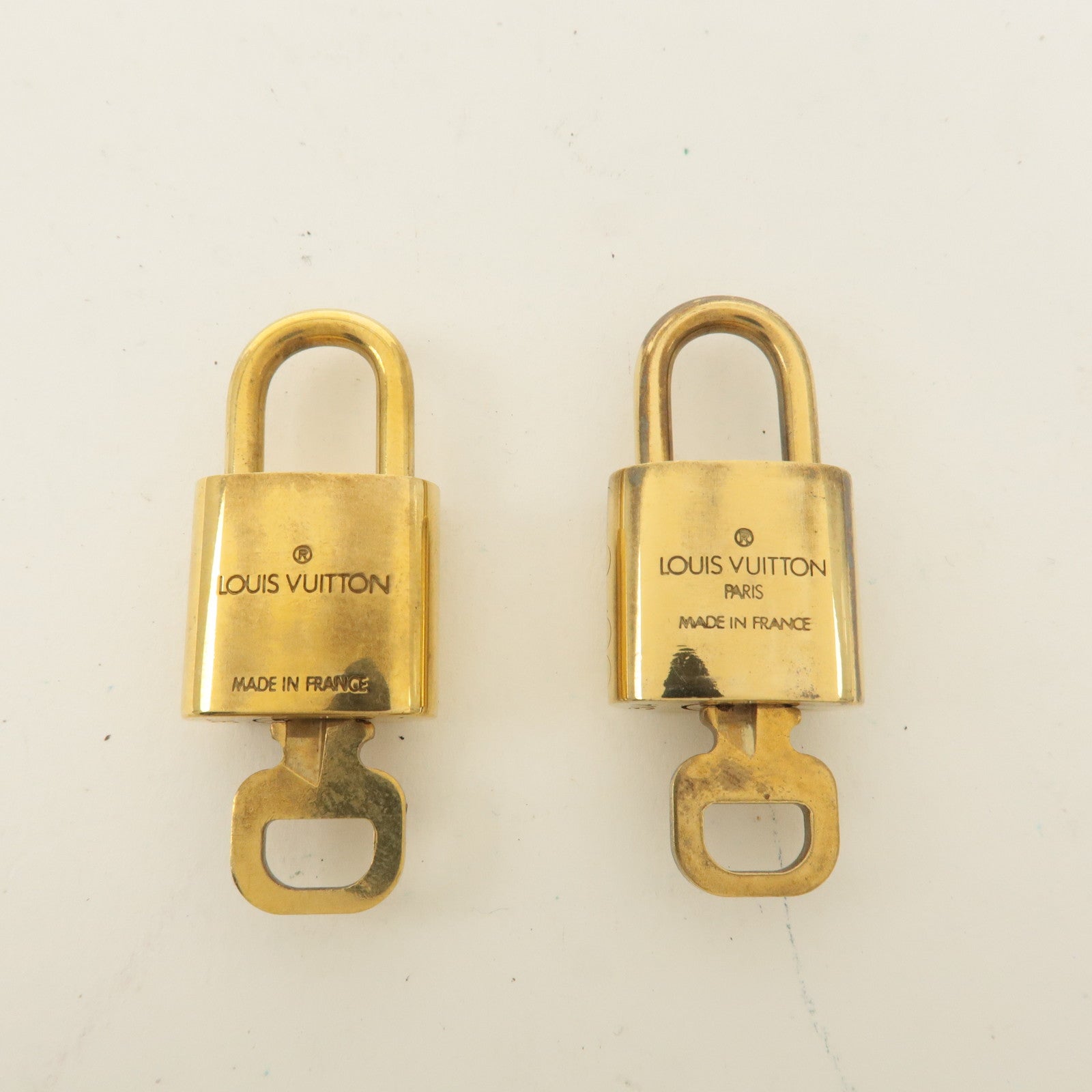 Louis Vuitton Set of 10 Lock 
Key Cadena Key Lock Gold