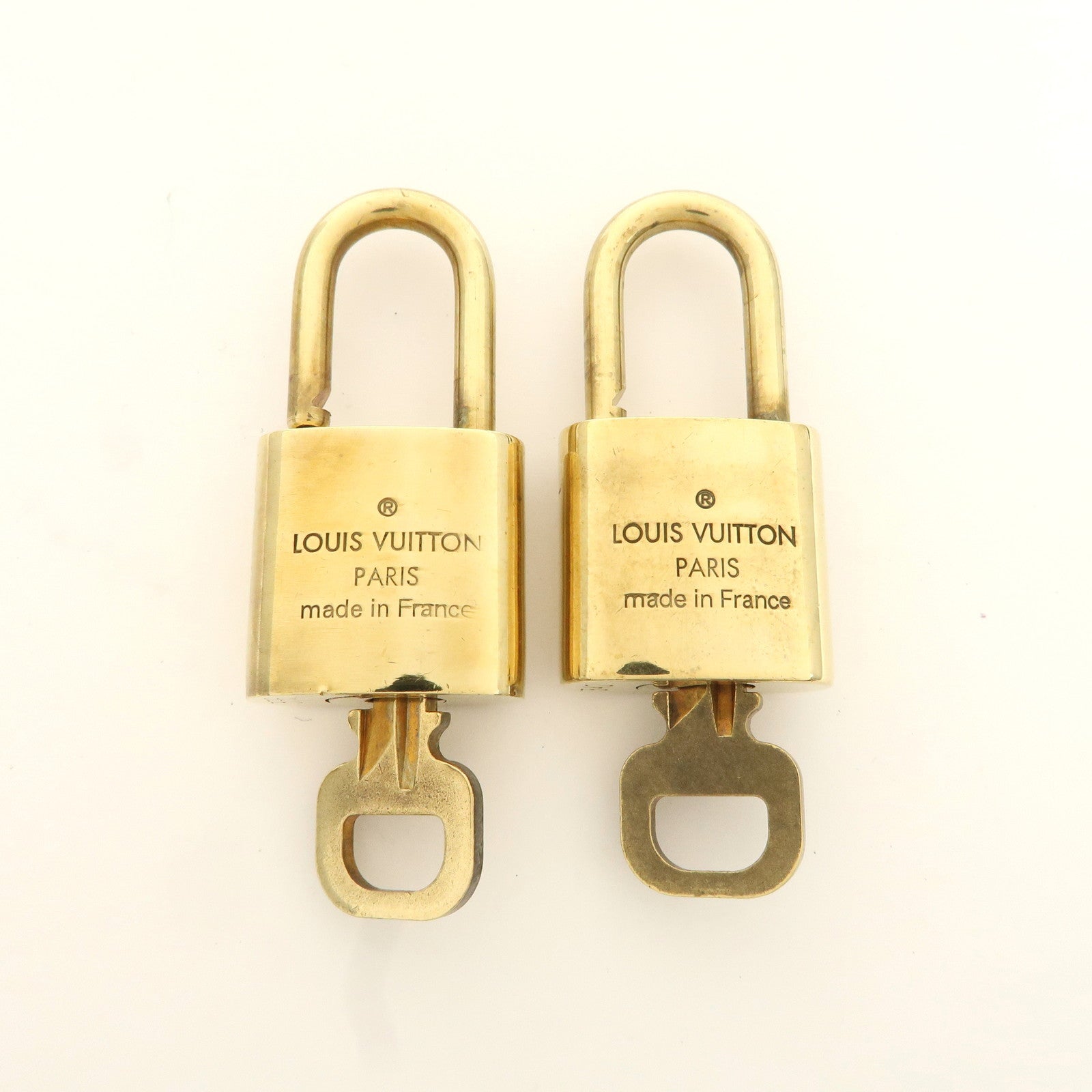 Louis Vuitton Set of 10 Lock 
Key Cadena Key Lock