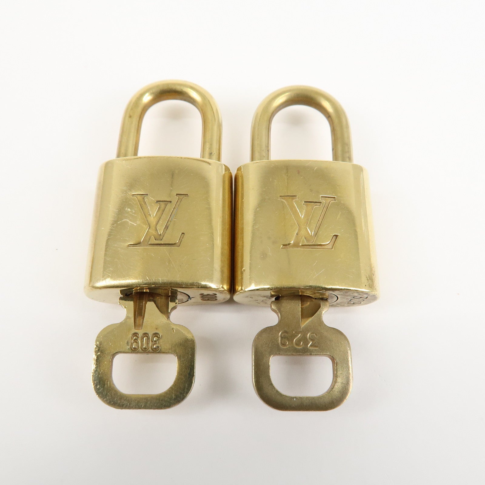 Louis Vuitton Set of 10 Lock 
Key Cadena Key Lock Metal Gold Used