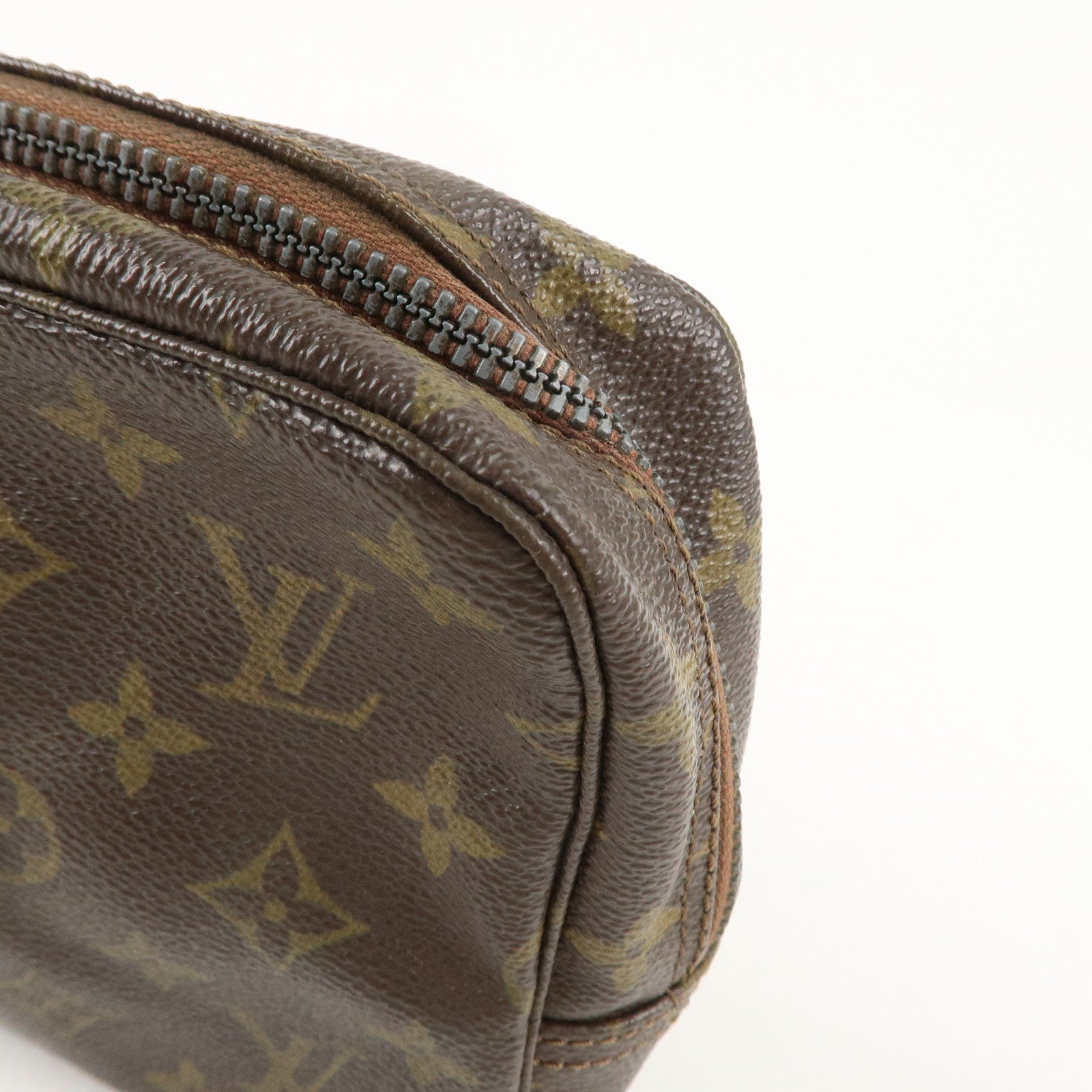 is Vuitton Monogram Trousse Toilette 23 Cosmetic Pouch M47524