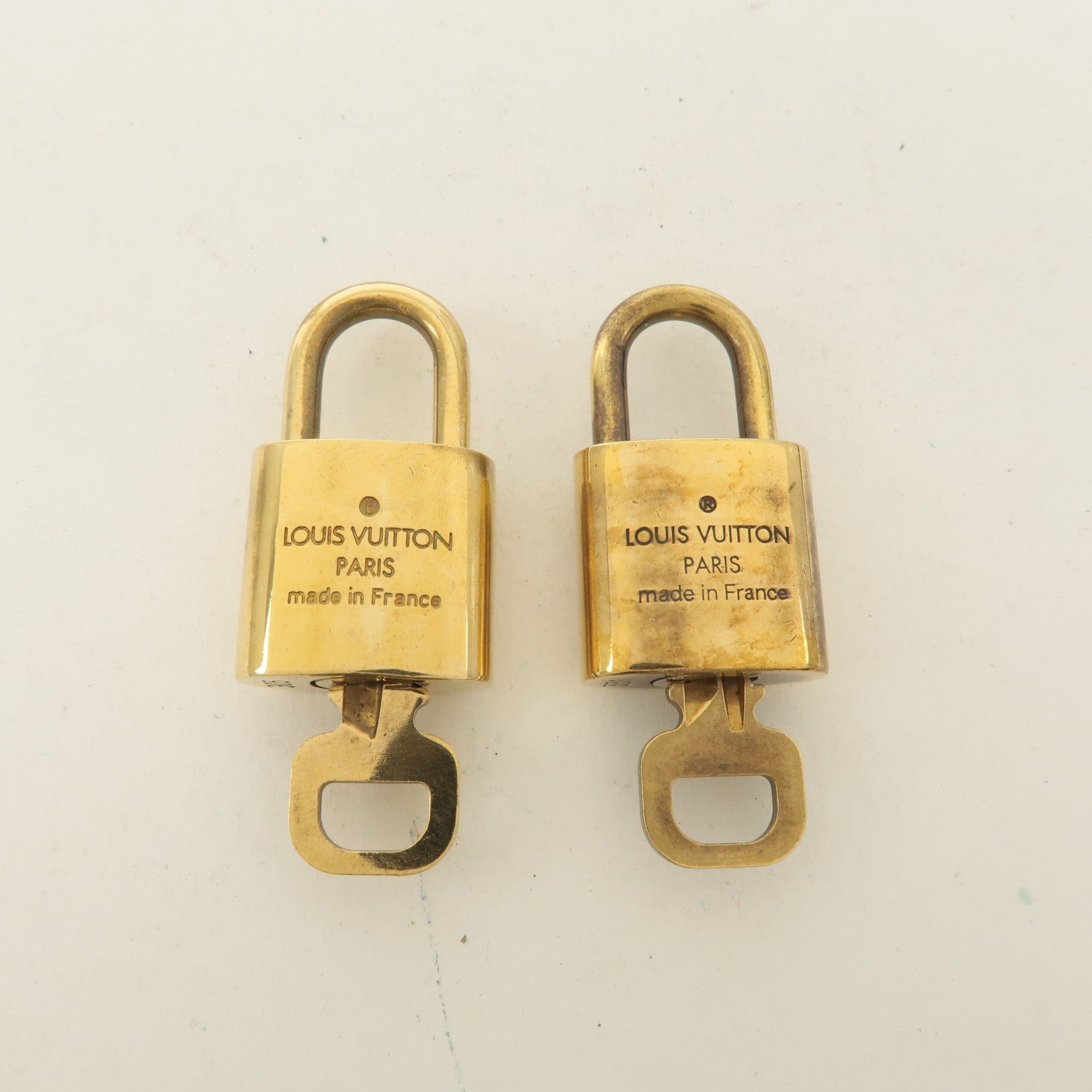 Louis Vuitton Set of 10 Lock 
Key Cadena Key Lock Gold