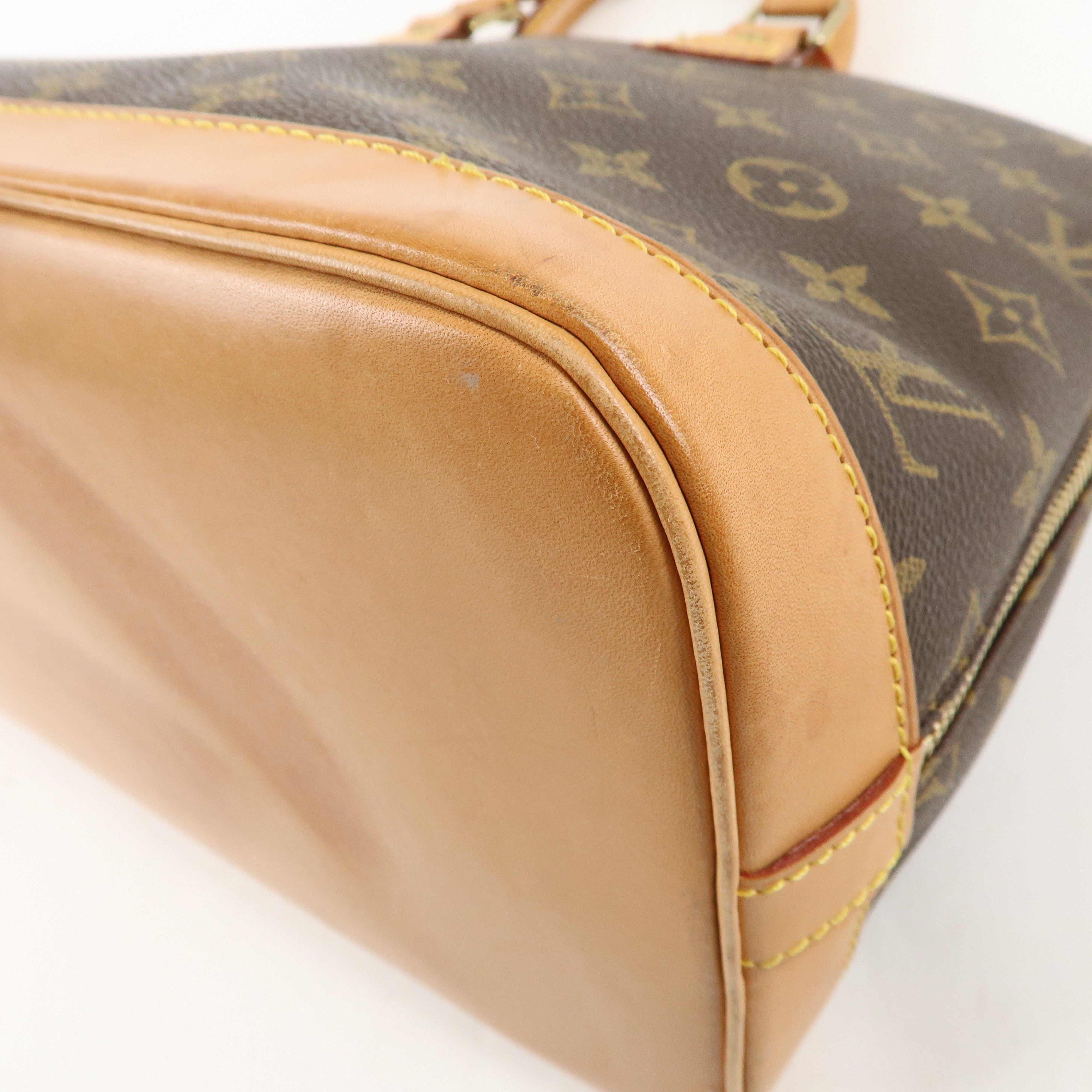 Louis Vuitton Monogram Alma Hand Bag Brown M51130