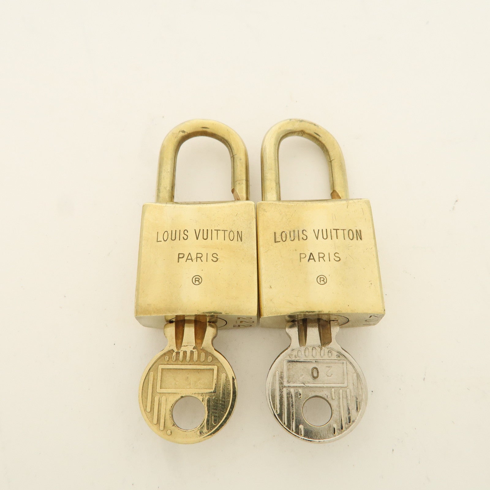 Louis Vuitton Set of 10 Lock 
Key Cadena Key Lock Used