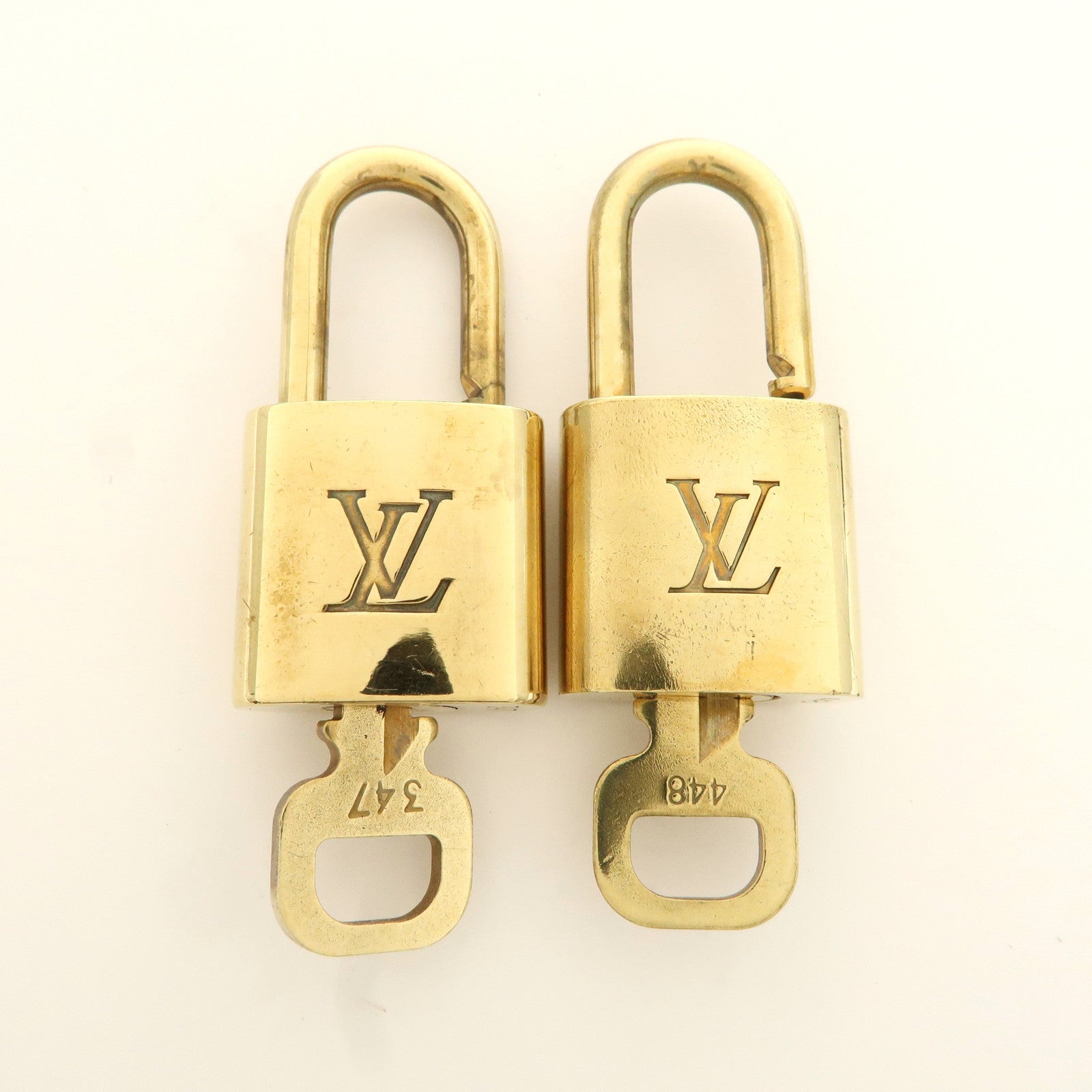 Louis Vuitton Set of 10 Lock 
Key Cadena Key Lock