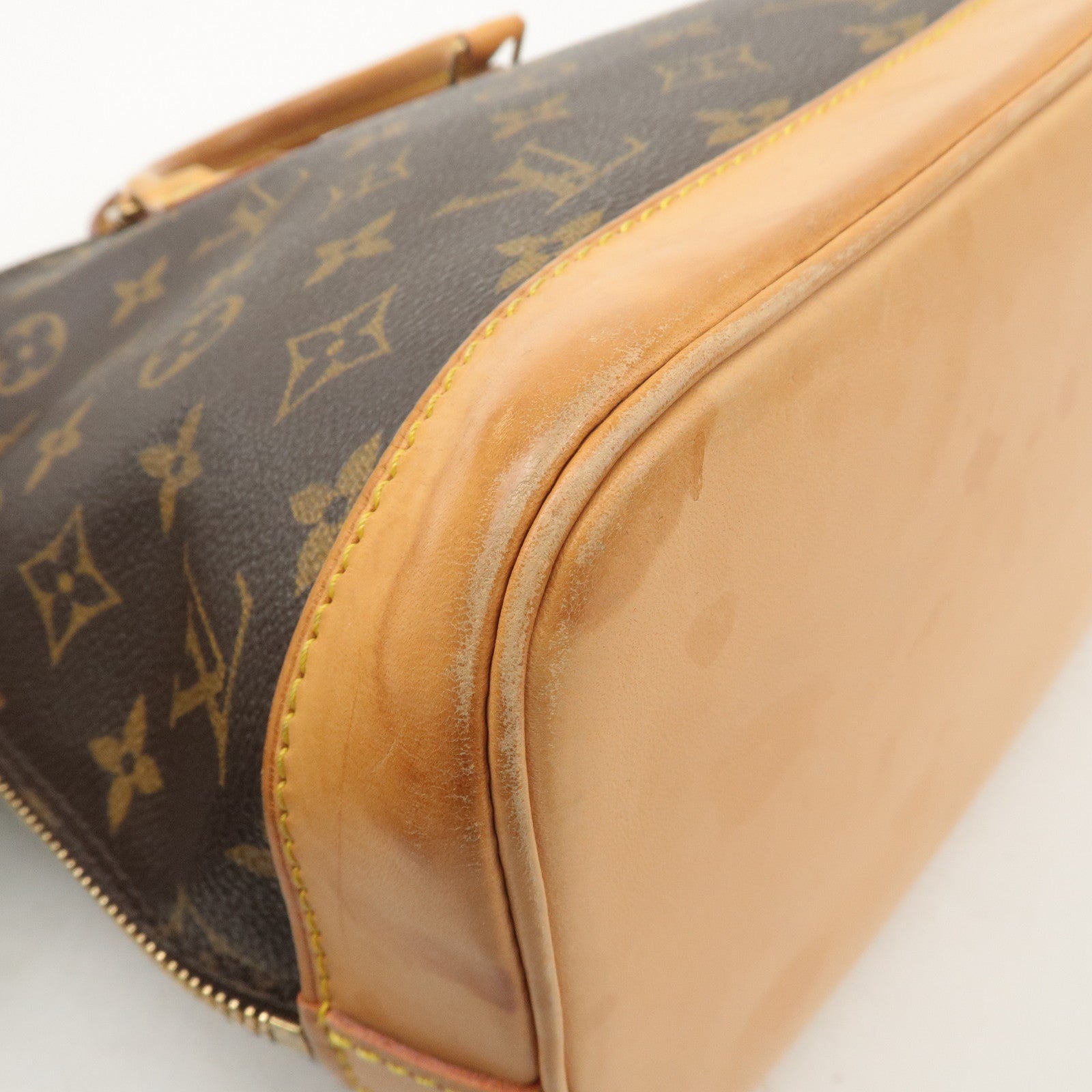 Louis Vuitton Monogram Alma Hand Bag Brown M51130