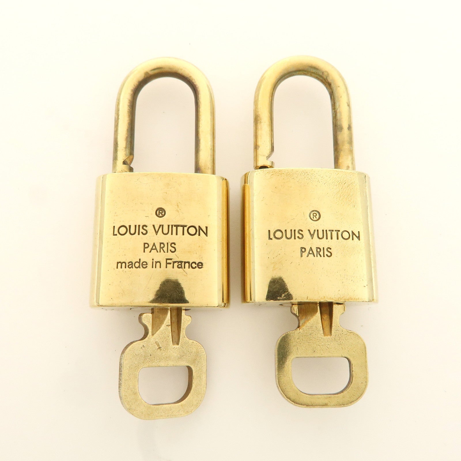 Louis Vuitton Set of 10 Lock 
Key Cadena Key Lock